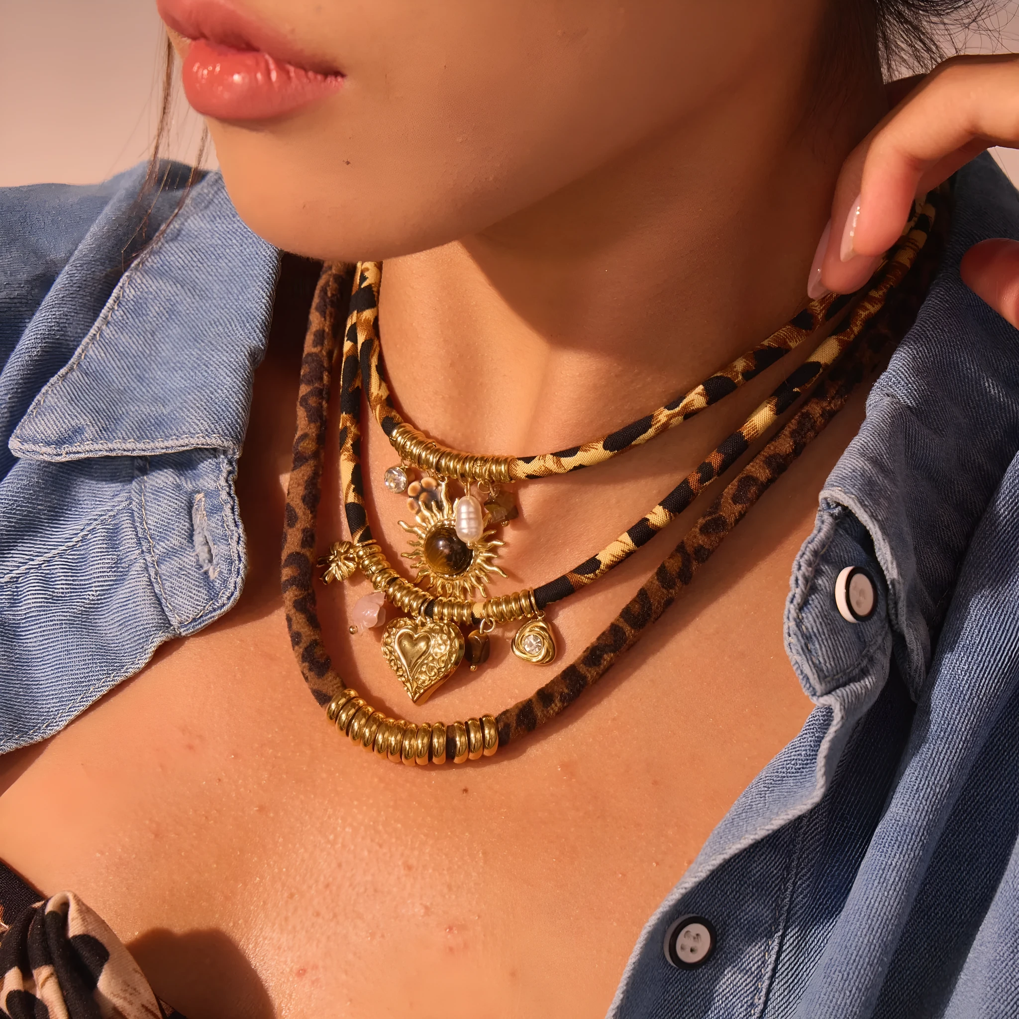 Geometric leopard pendant necklace with electroplated 18K gold finish on stainless steel chain