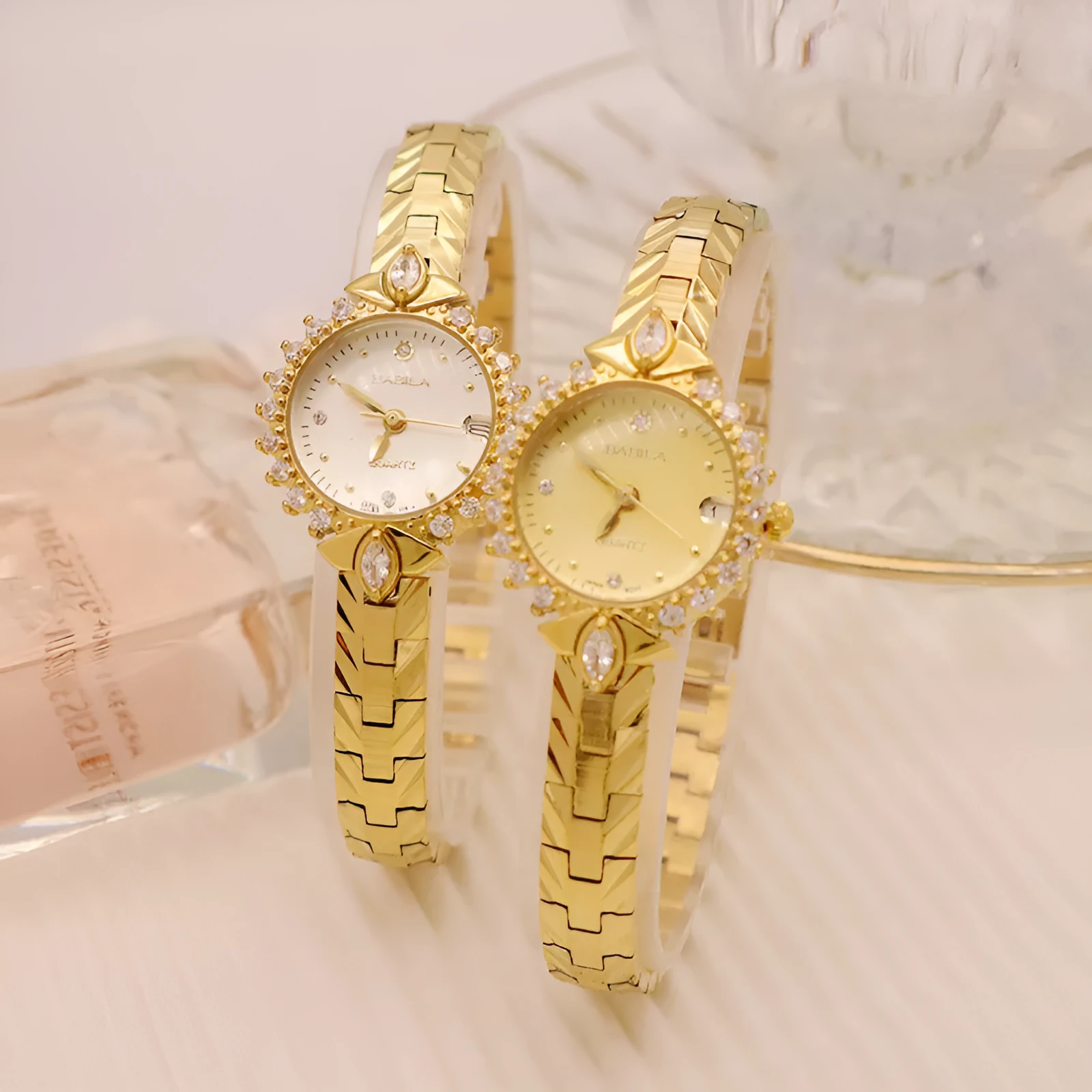 Women's vintage quartz watch with gold face and diamond embossed bracelet, slim 6mm design on a neutral background