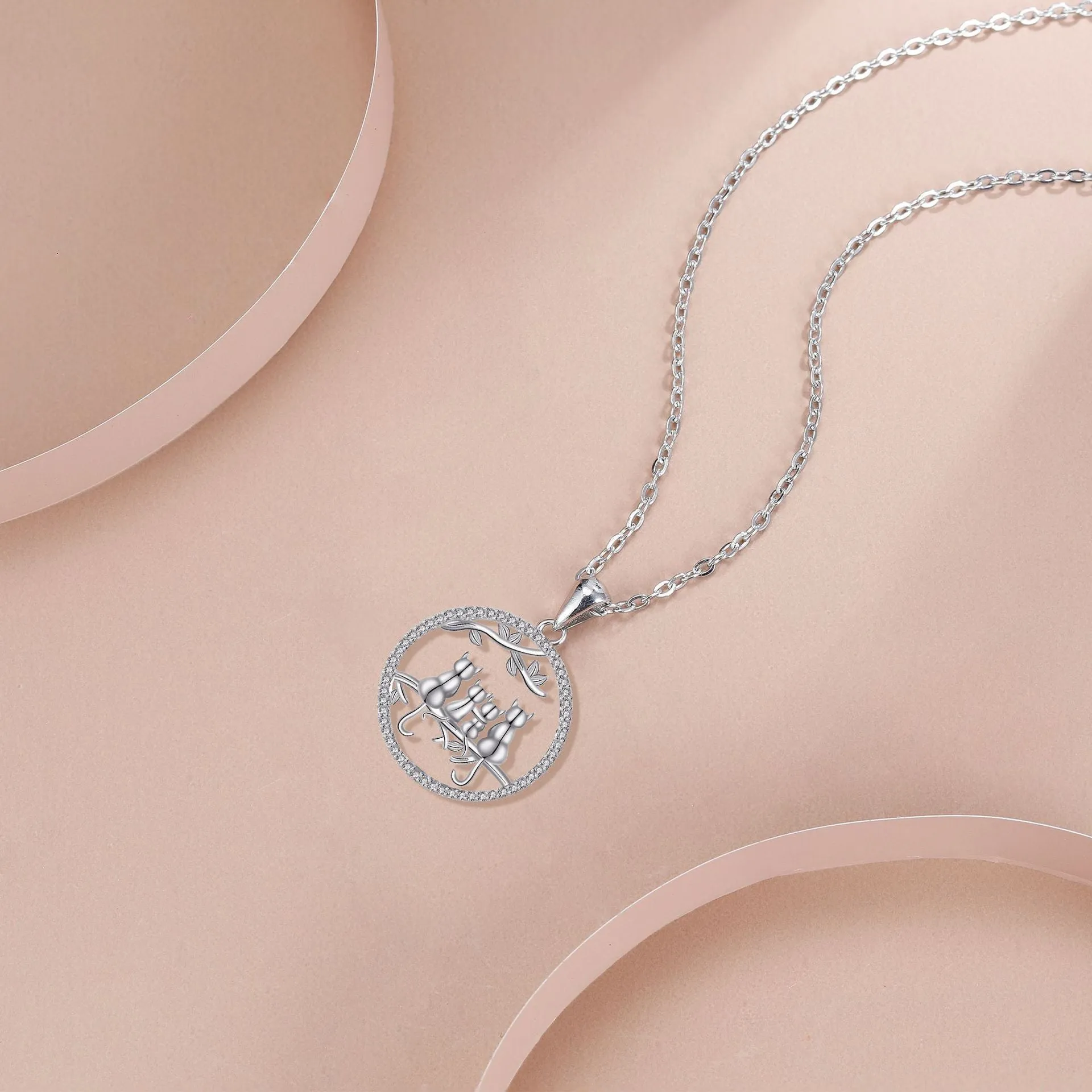 Four Kitten Necklace with copper pendant and cross chain in original design.