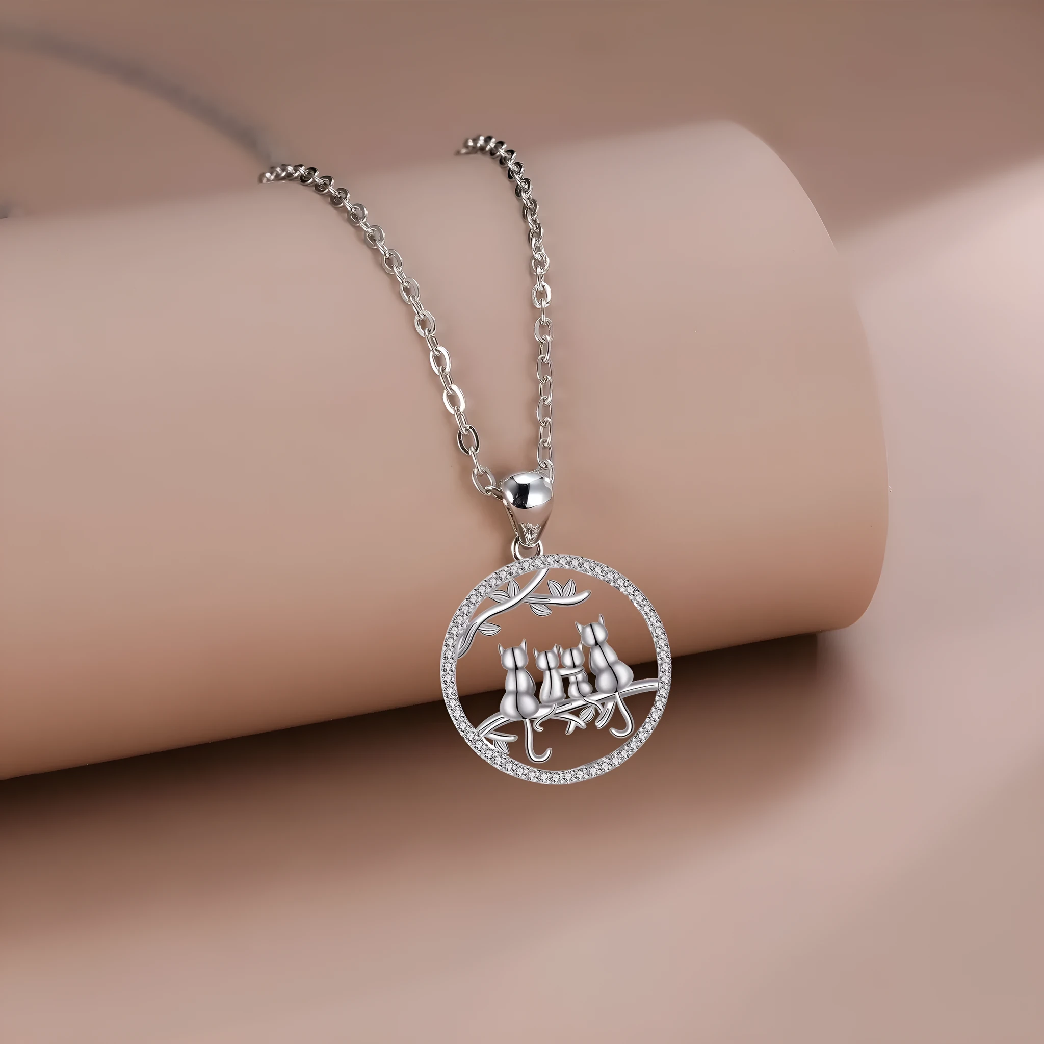Four Kitten Necklace with copper pendant and cross chain in original design.