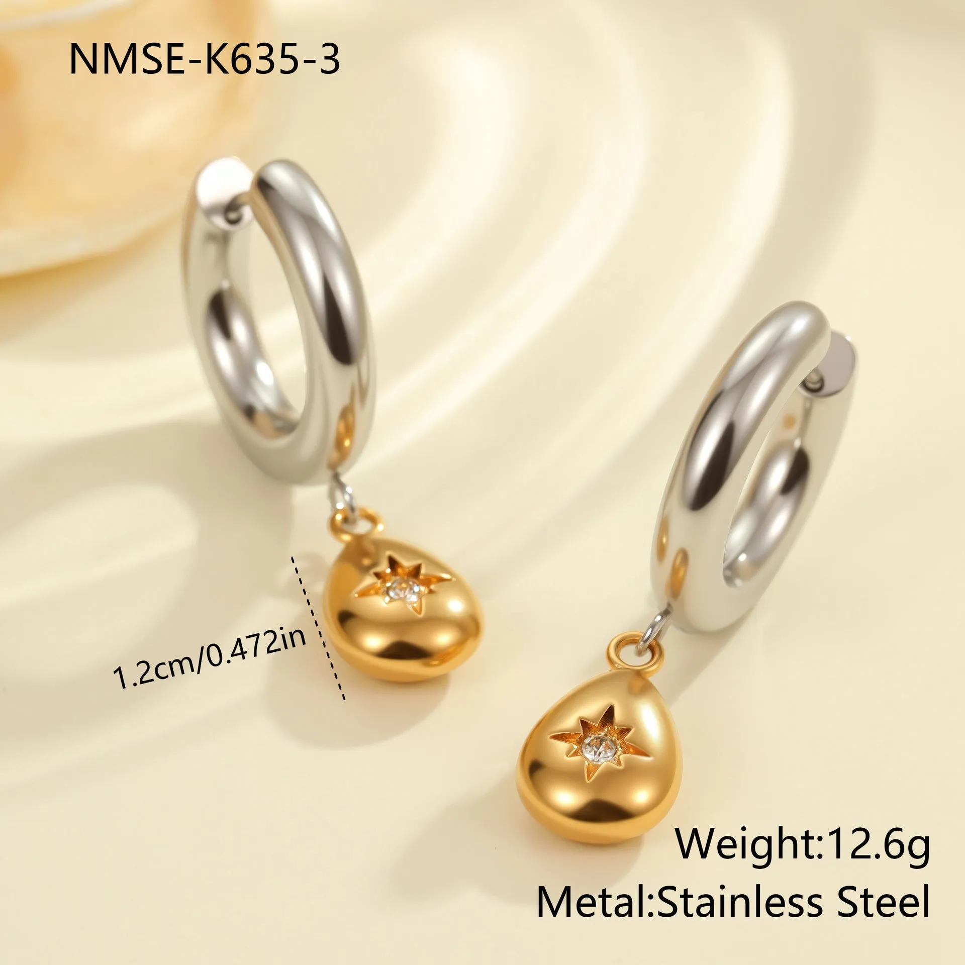 Stainless steel geometric earrings with 18K electroplated finish showing heart and star shapes