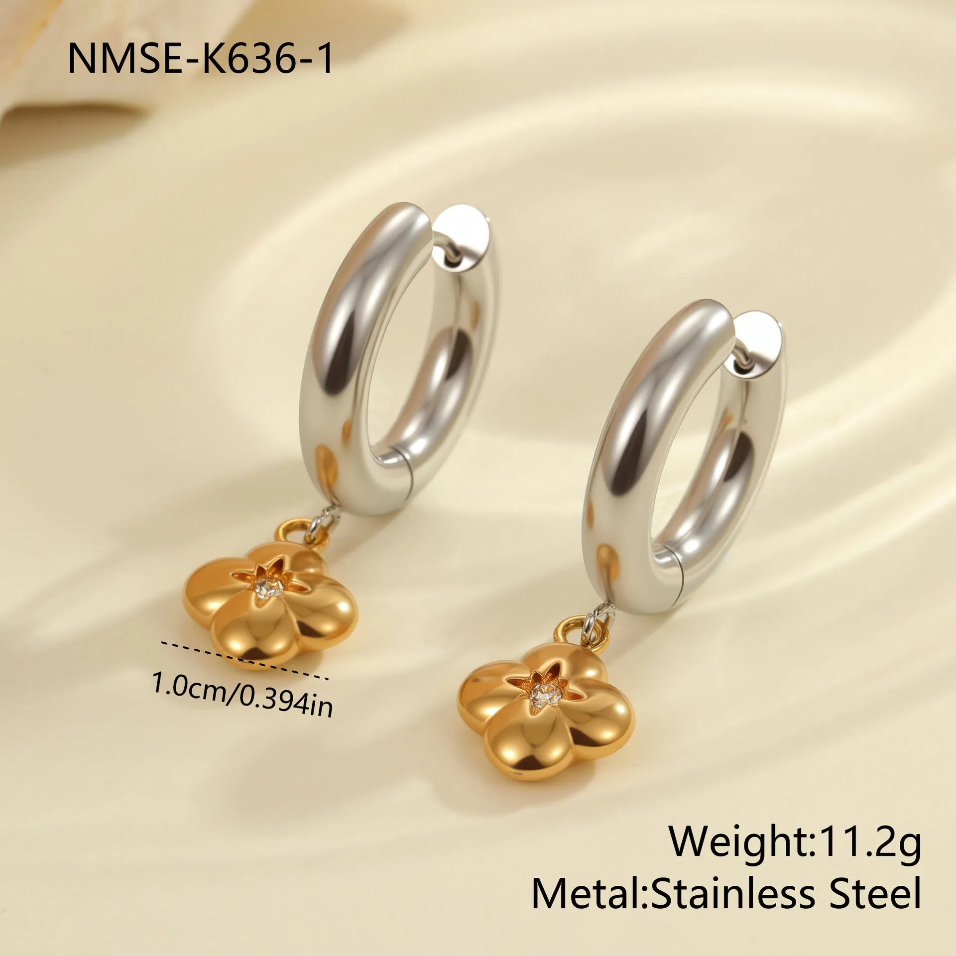 Stainless steel geometric earrings with 18K electroplated finish showing heart and star shapes