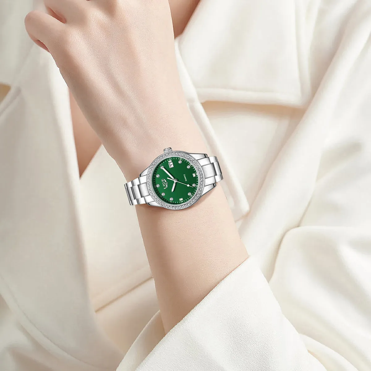 Fashion Girl quartz watch with diamond-encrusted bezel, silver stainless steel bracelet, round 34mm dial with luminous hands