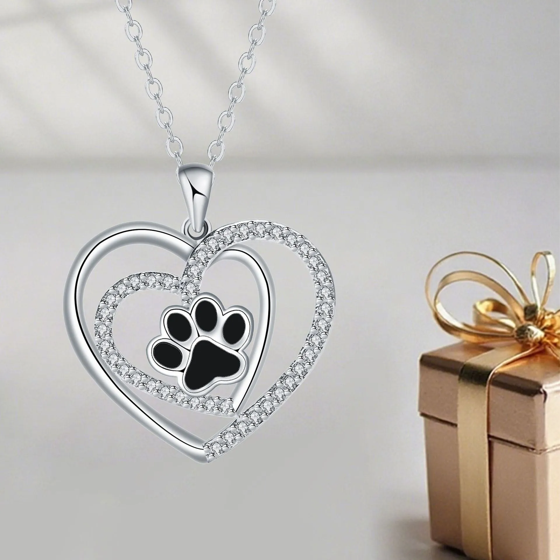 Women's dog paw prints heart necklace with copper pendant and cross chain in electroplated finish