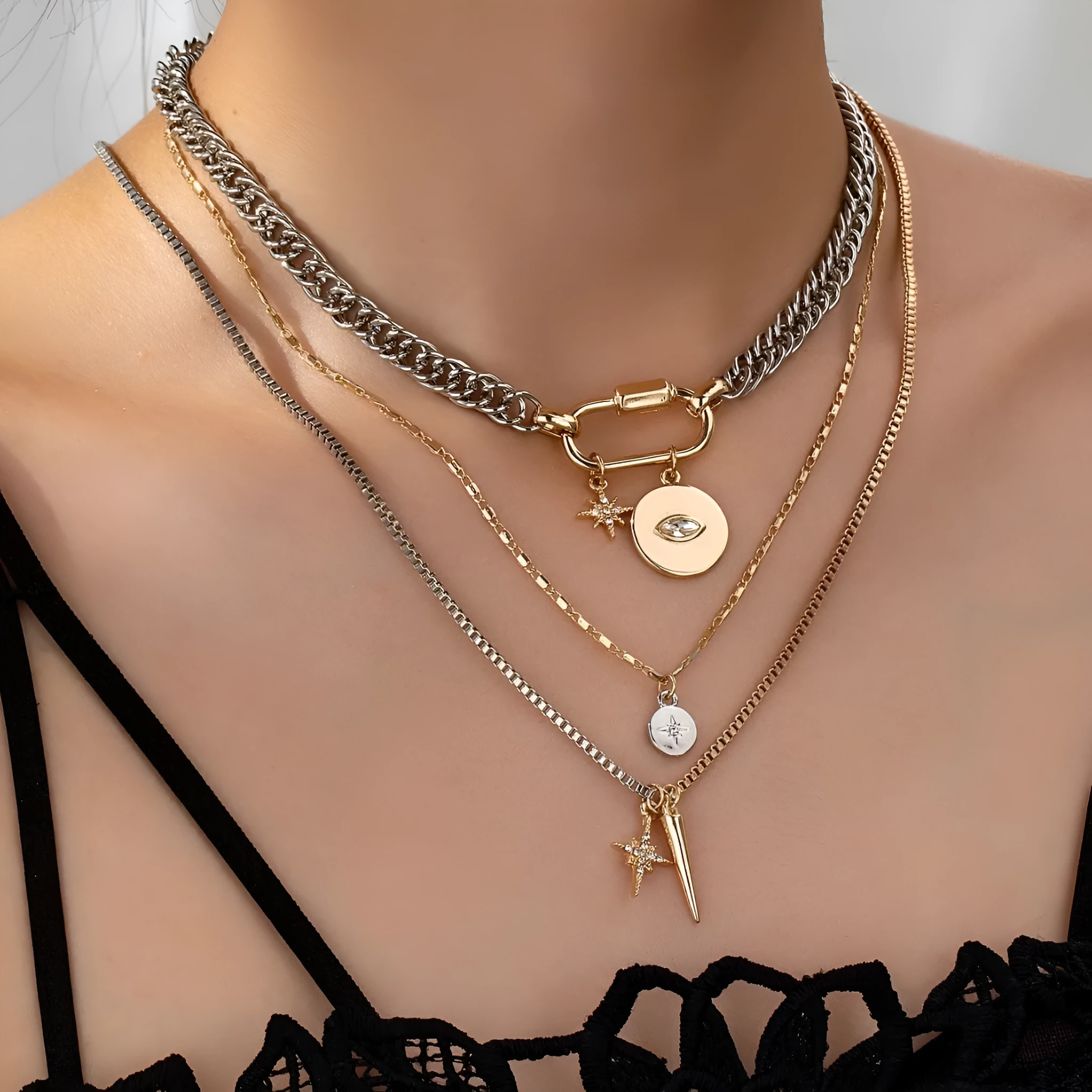 Alloy multi-layer twin necklace with geometric elliptical pendant on a white background
