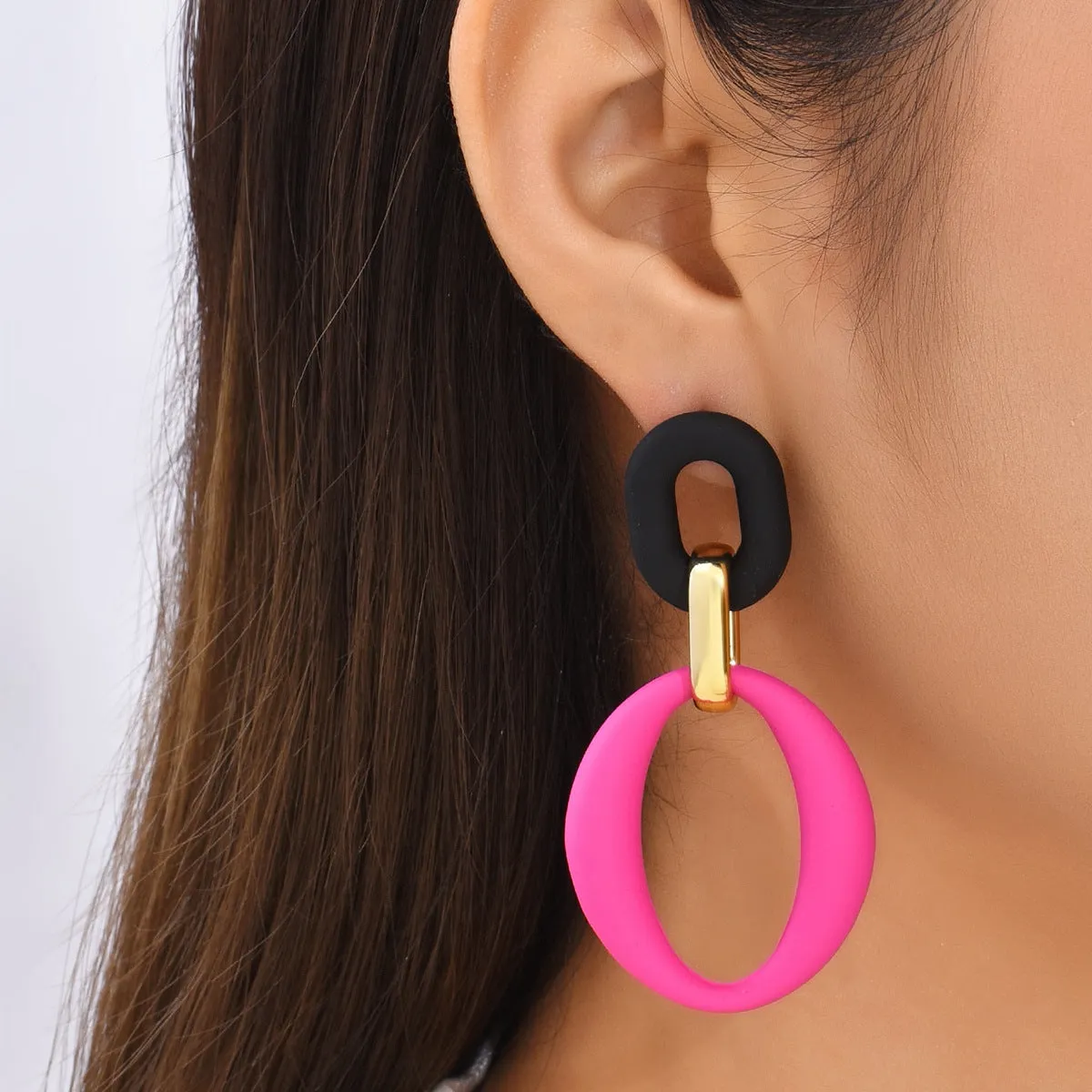 Geometric exaggerated hoop earrings in acrylic with retro style, clip-on fitting, alloy posts, available in assorted colours, 6cm diameter