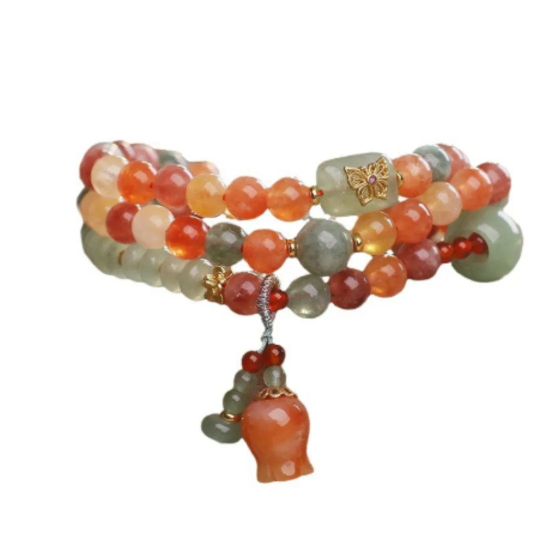 Natural Jinsi Jade multi-circle bracelet with round beads and lily pendant on display
