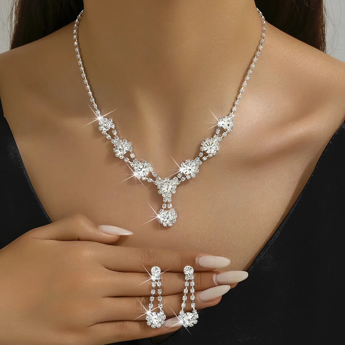 Rhinestone crystal necklace and earrings set in silver colour