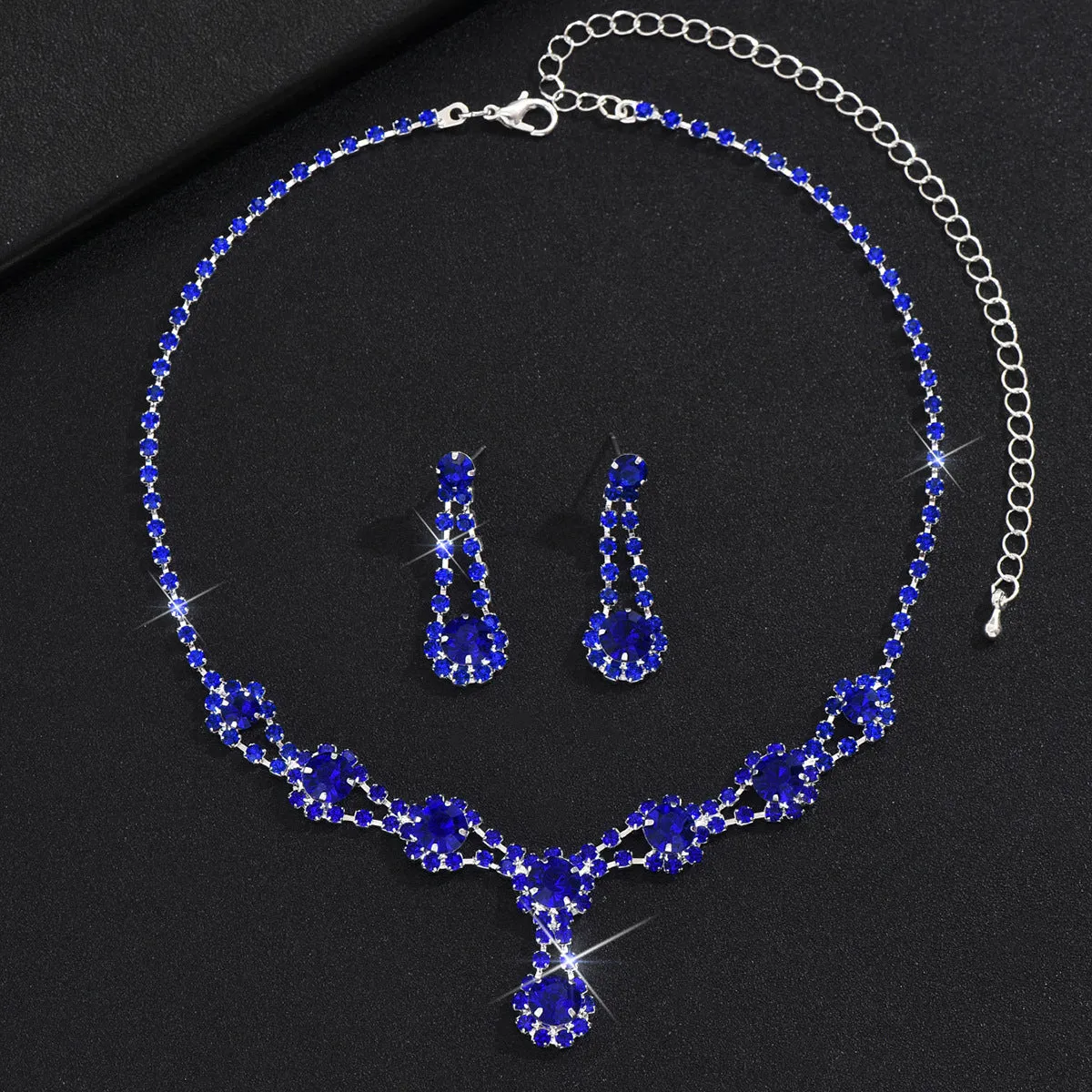 Rhinestone crystal necklace and earrings set in silver colour