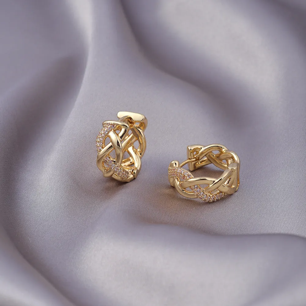 Pair of micro zircon-encrusted woven twisted stud earrings in gold real gold plating finish