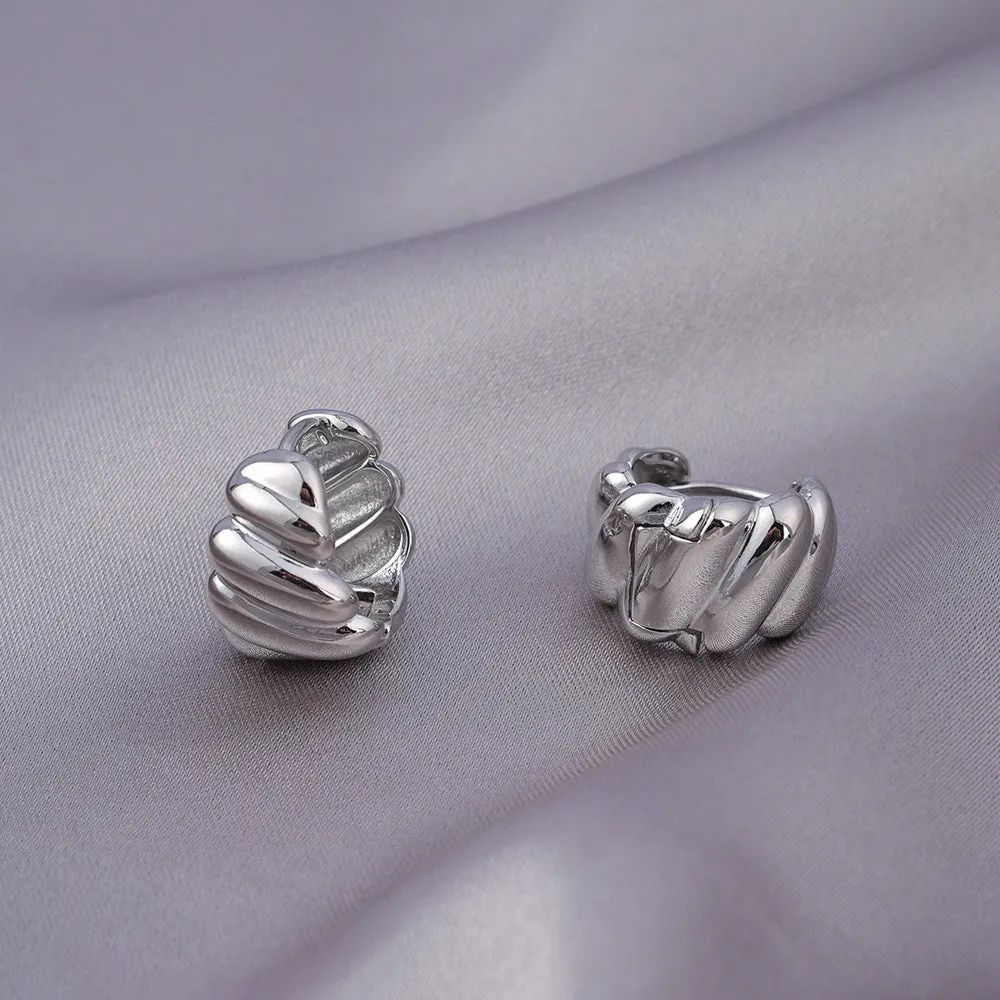 Pair of micro zircon-encrusted woven twisted stud earrings in gold real gold plating finish