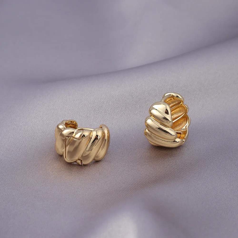 Pair of micro zircon-encrusted woven twisted stud earrings in gold real gold plating finish