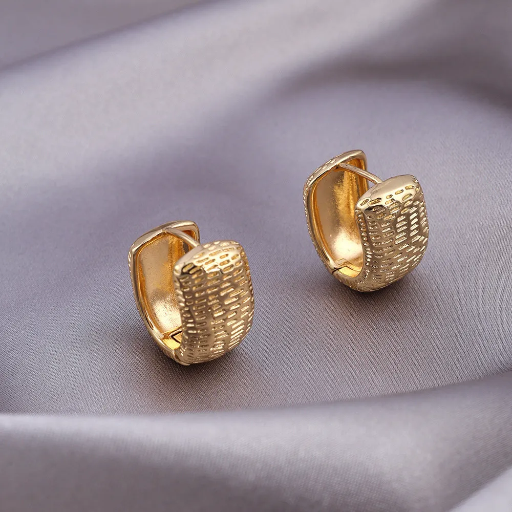 Pair of micro zircon-encrusted woven twisted stud earrings in gold real gold plating finish