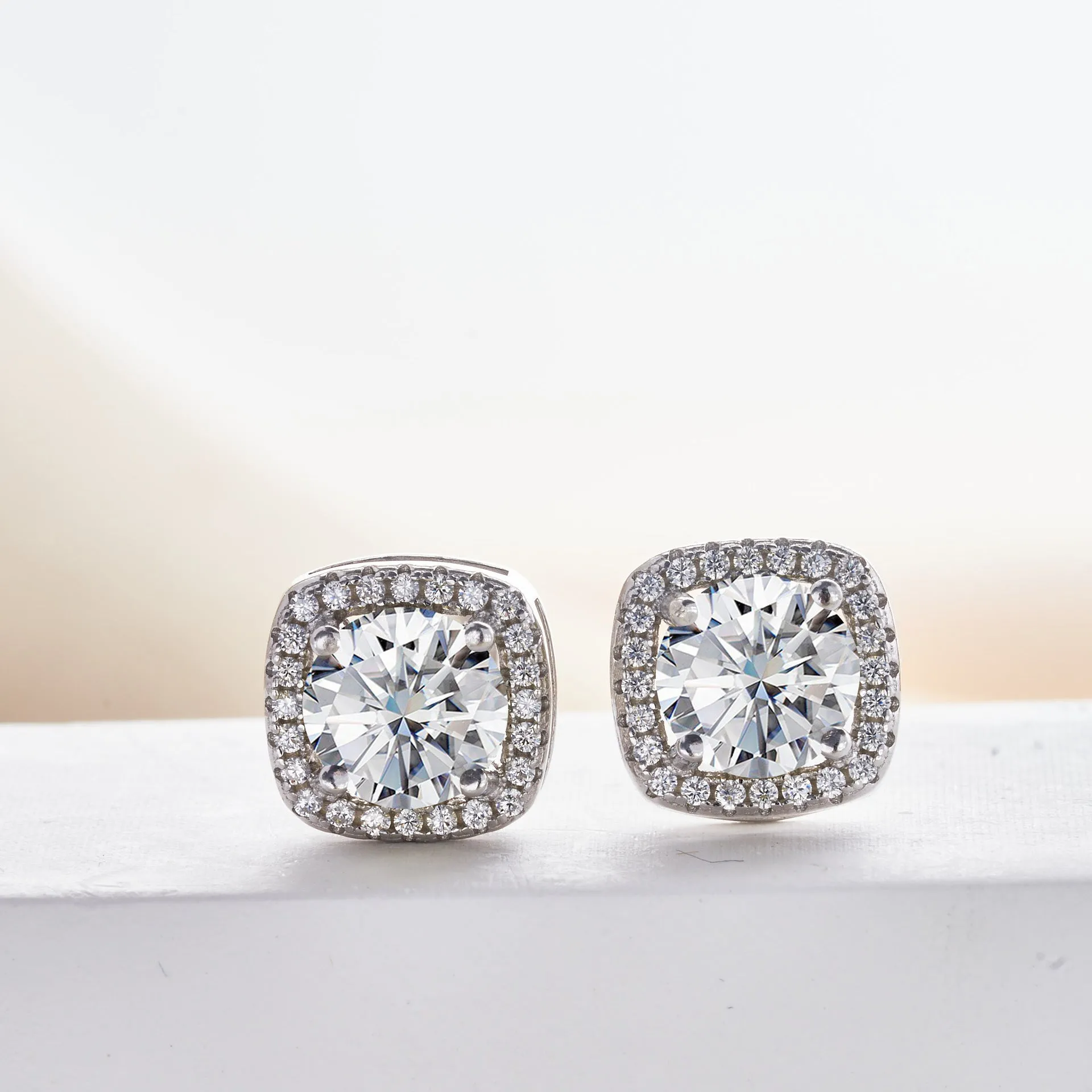 Micro inlaid moissanite stud earrings in S925 sterling silver with round natural stones, unisex design, 1CT per pair