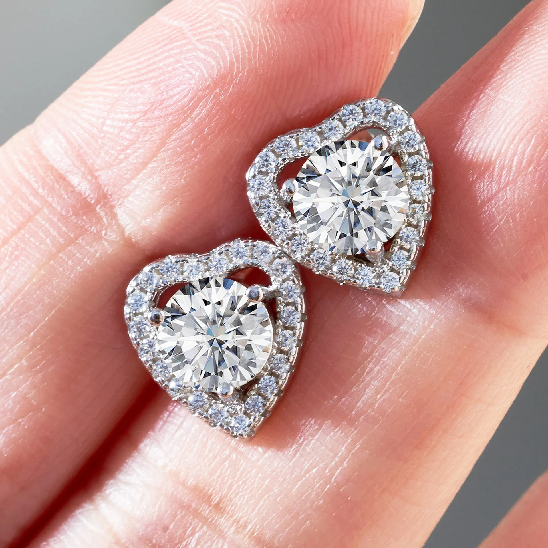Micro inlaid moissanite stud earrings in S925 sterling silver with round natural stones, unisex design, 1CT per pair