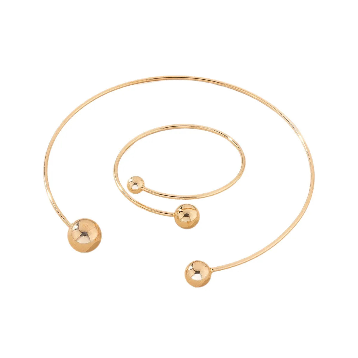 Gold silver ball dislocation thin open-end bangle bracelet with matching necklace ornament on white background