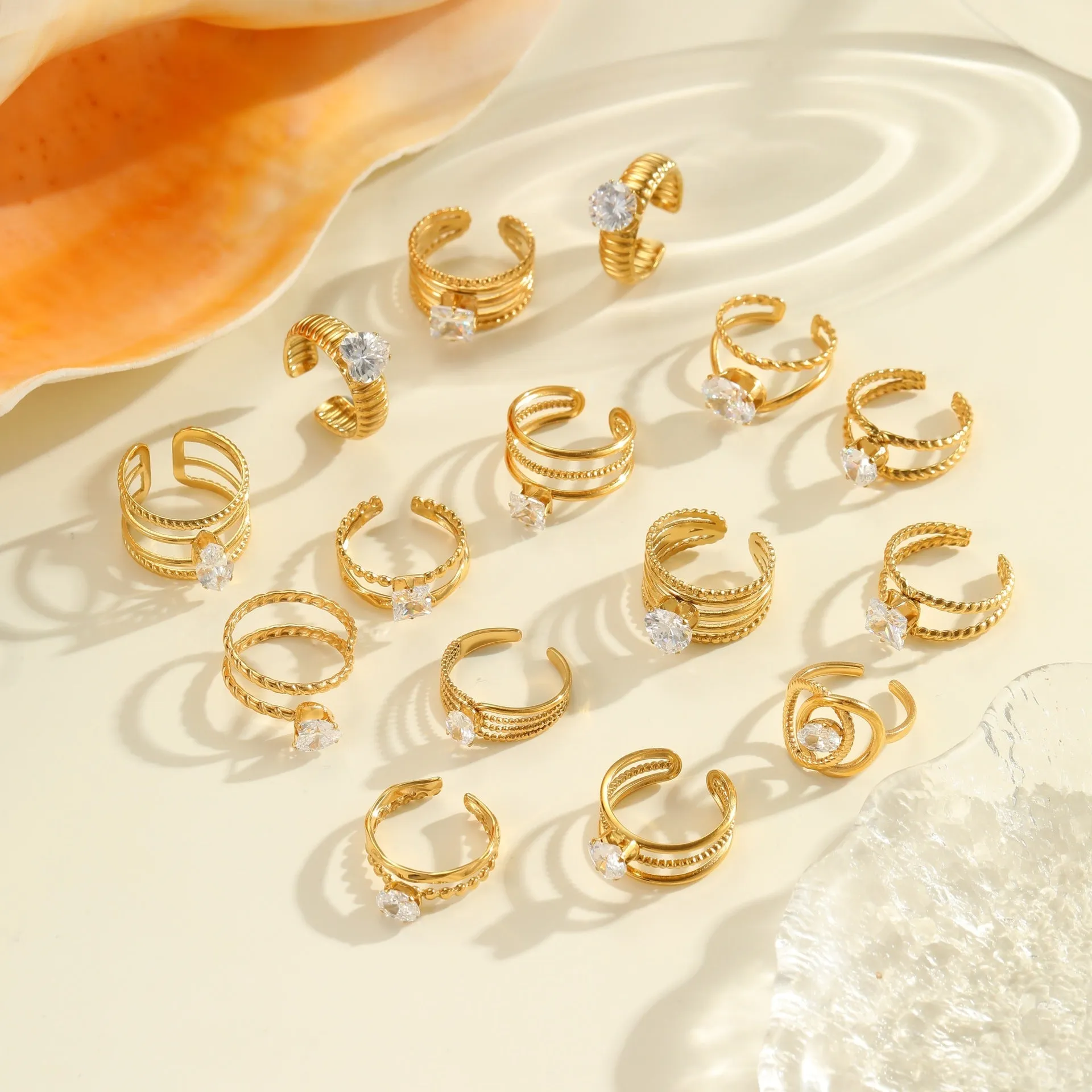 Gold electroplated stainless steel open mouth ring with zircon decoration and geometry design