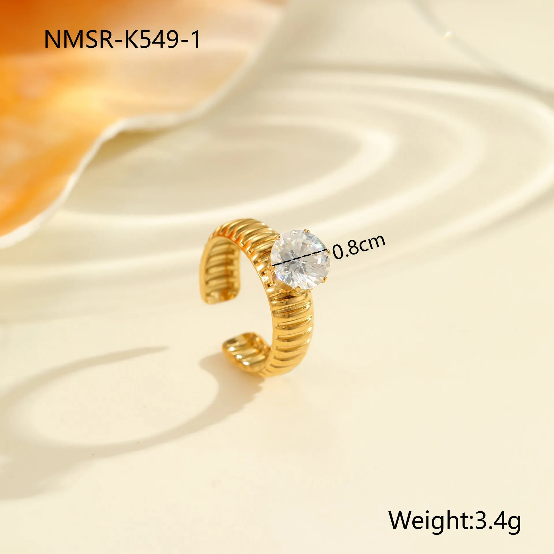Gold electroplated stainless steel open mouth ring with zircon decoration and geometry design