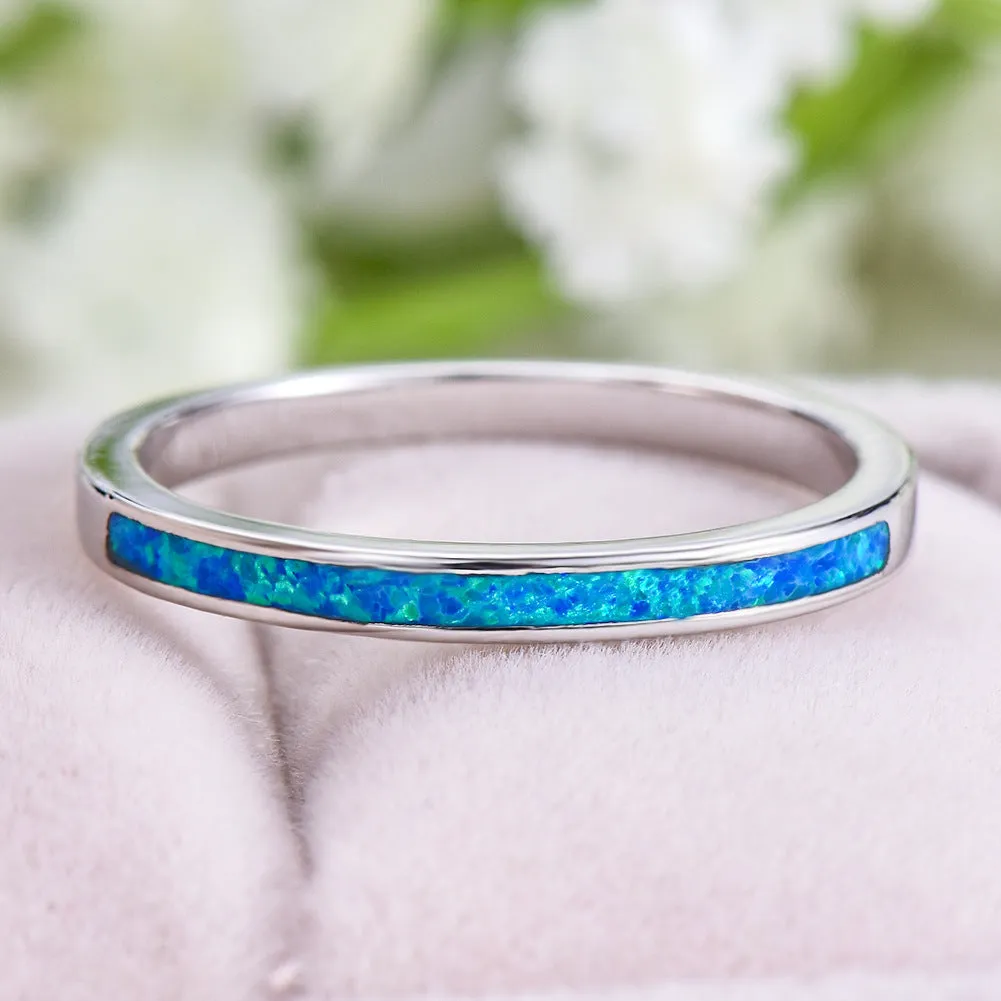Copper ring with round blue opal stone, geometric simple design