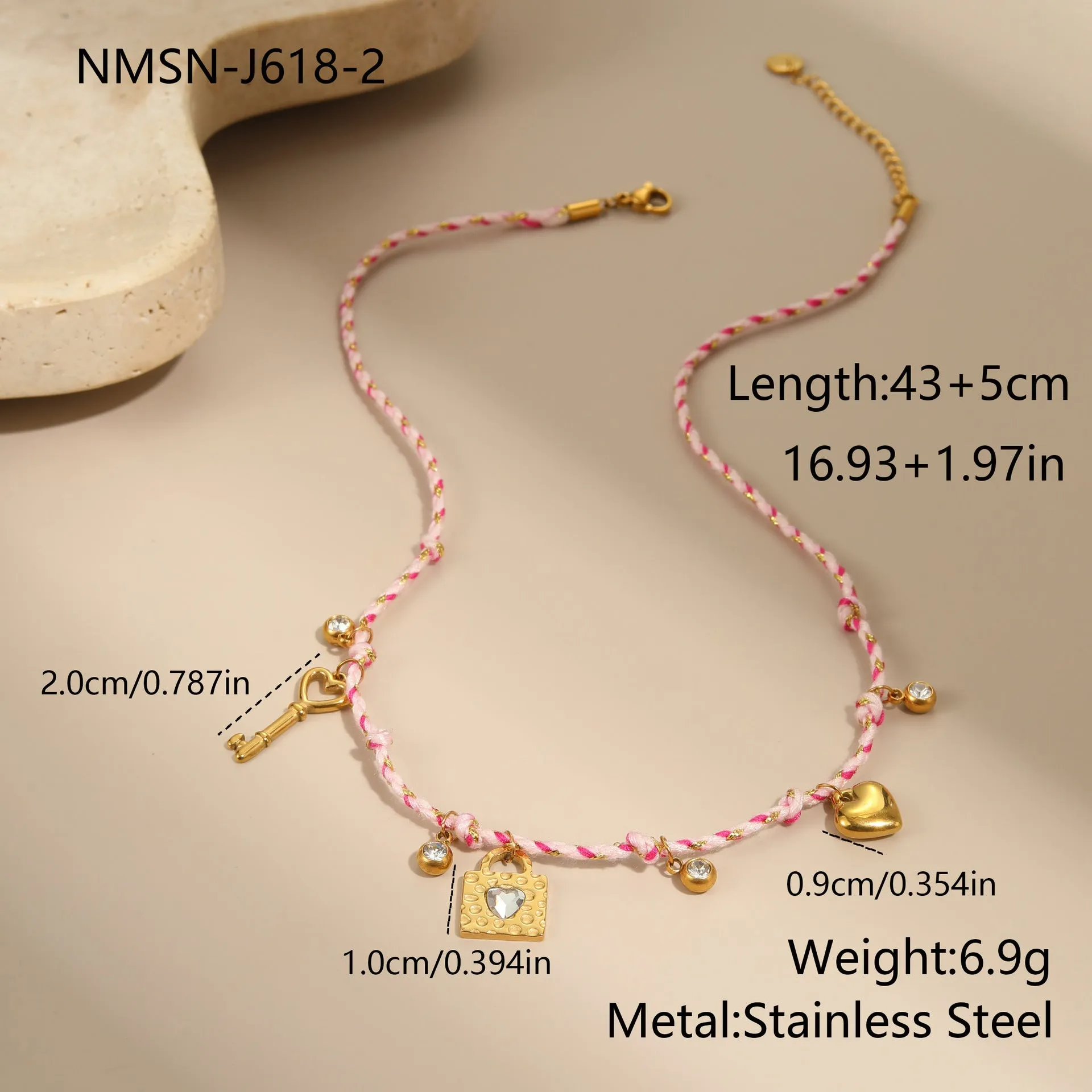 Handmade stainless steel necklace with coloured braided rope detail and geometric pendant
