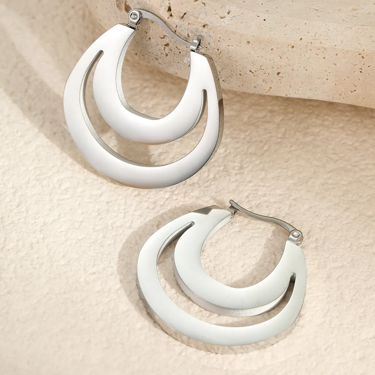 Geometric French earrings with round ring design in gold or steel metallic finish