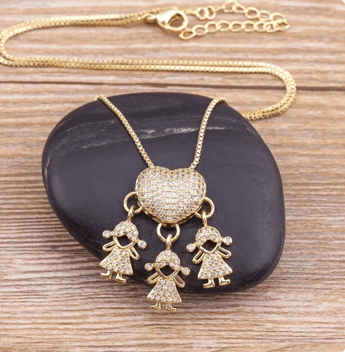 Gold colour heart-shaped cubic zirconia family pendant necklace on copper chain with style options for boys and girls