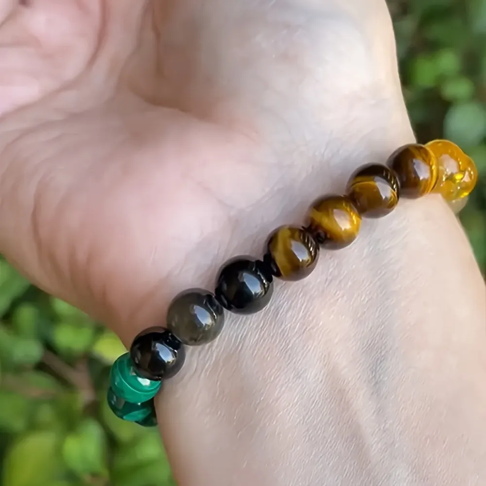Natural stone bracelet with citrine, dongling stone, and malachite in a crystal setting, unisex design