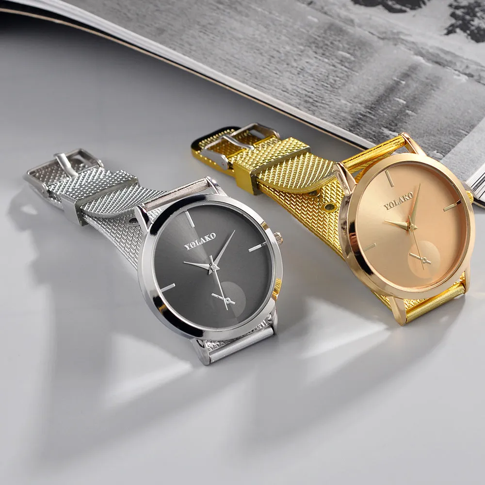 Simple ladies quartz watch with stainless steel strap, 40mm black dial, and mineral glass mirror on neutral background