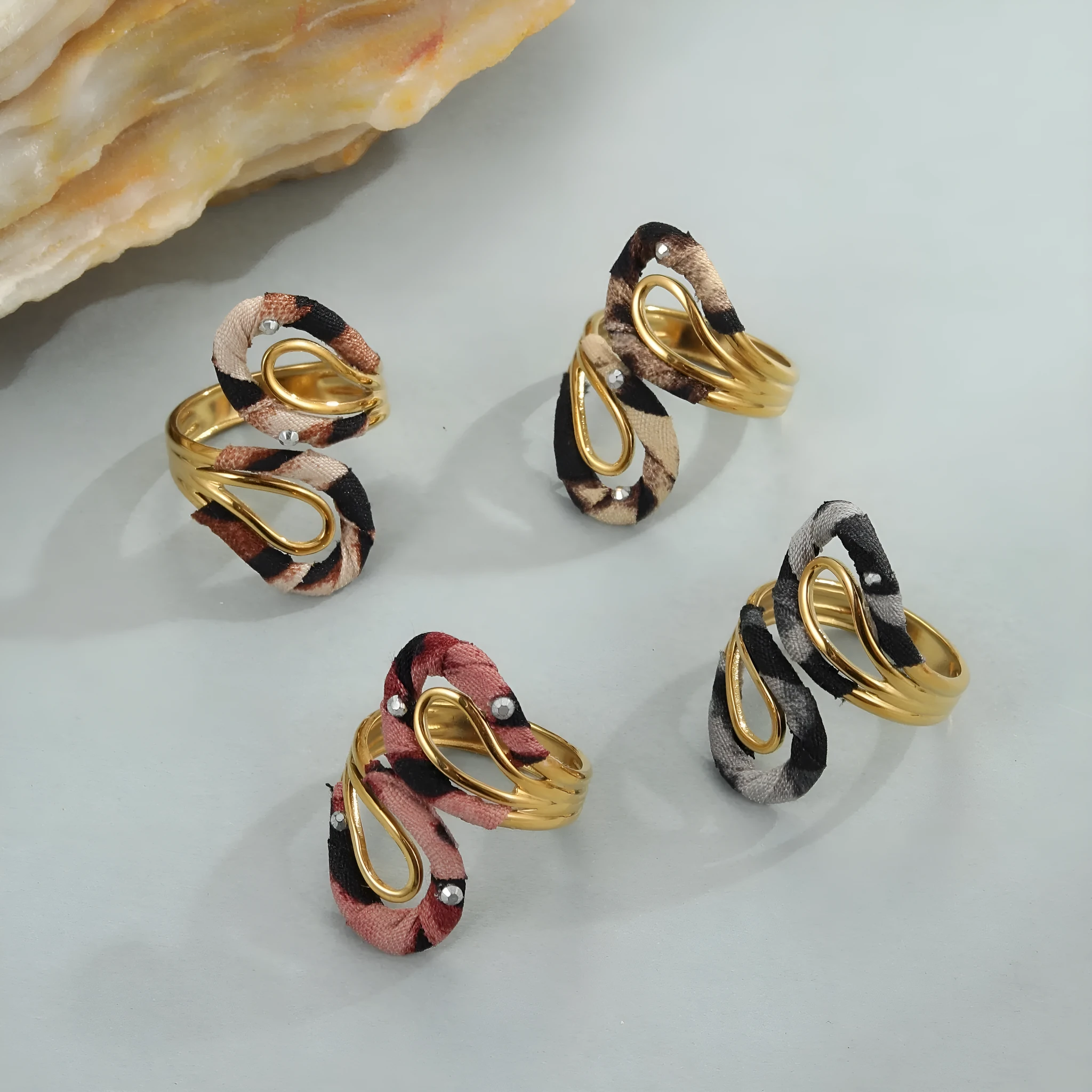 Stainless steel open mouth ring with leopard print design in geometric heart star shapes