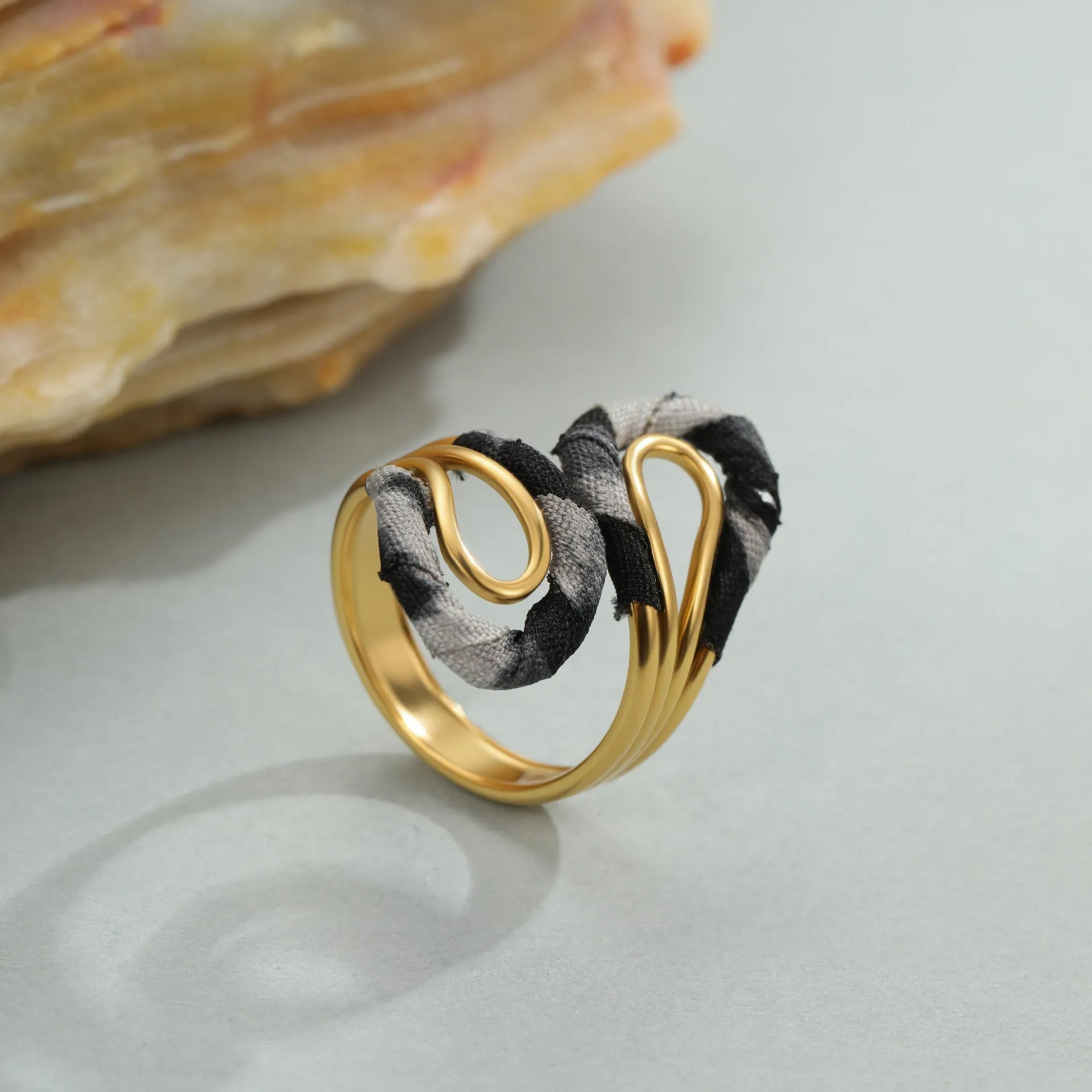 Stainless steel open mouth ring with leopard print design in geometric heart star shapes