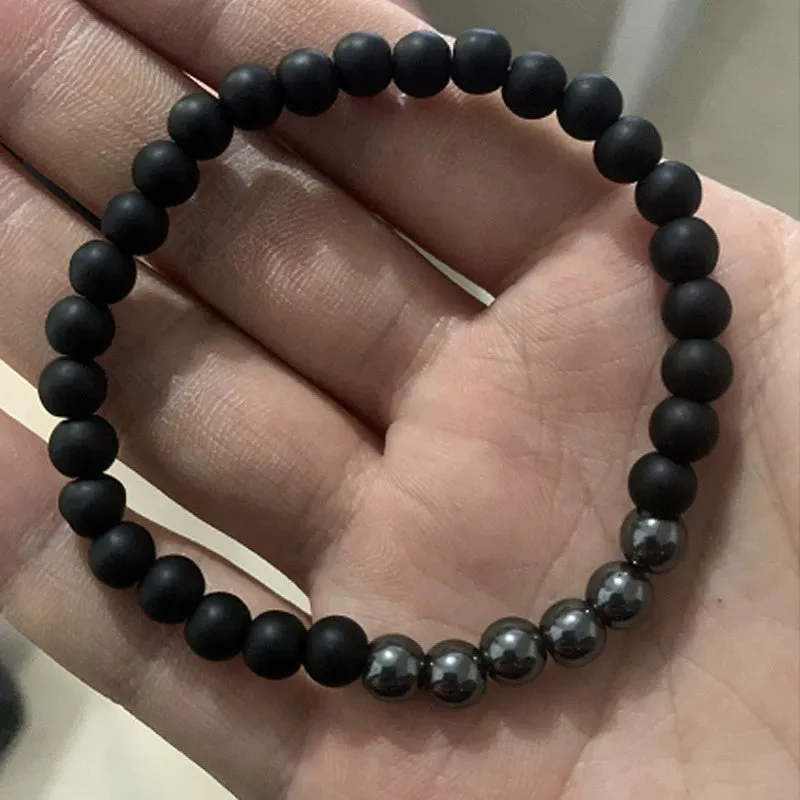 Micro-inlaid crown 6mm matte black copper bead bracelet with copper inlaid zircon on white background