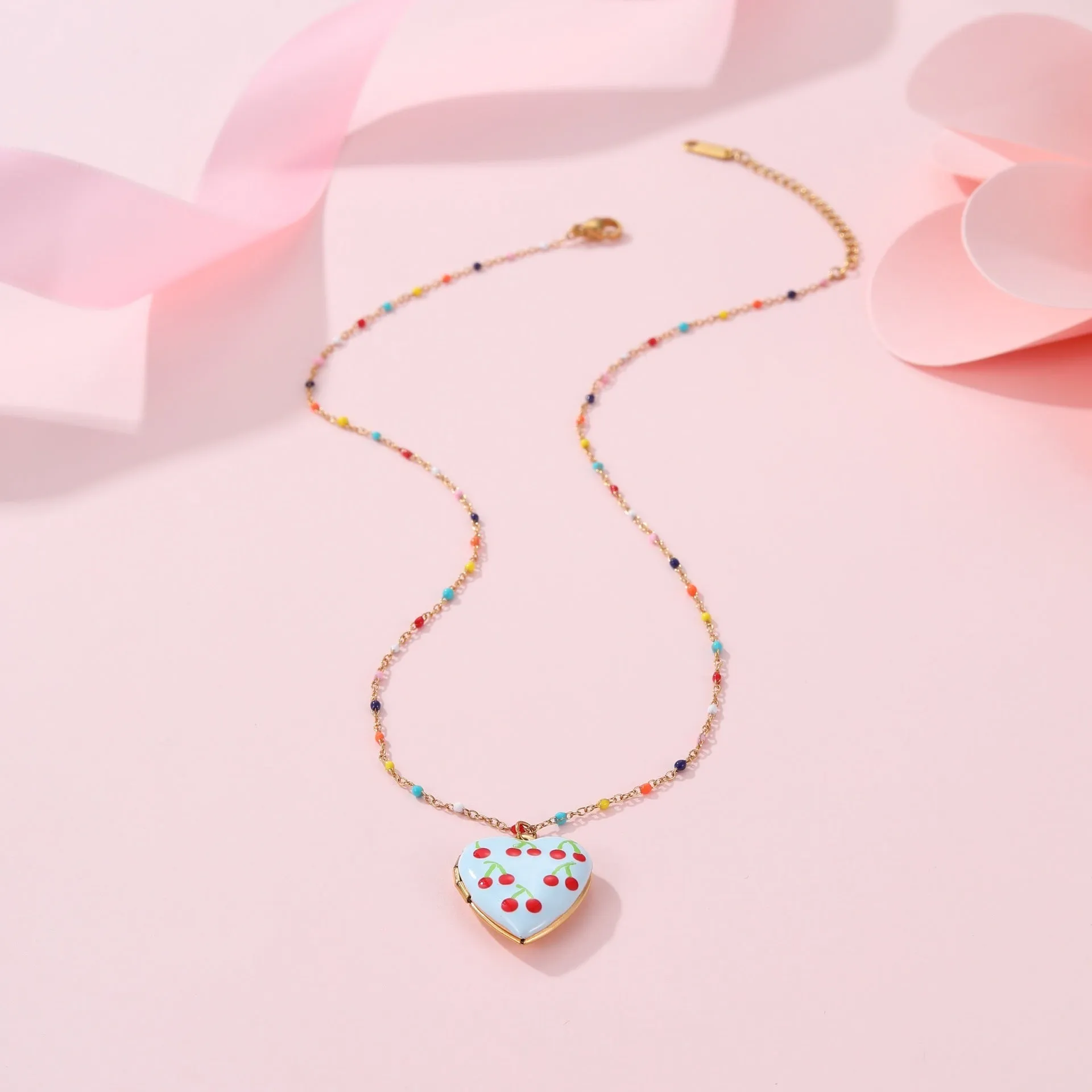 Gold-plated stainless steel necklace with fruit pendant on adjustable chain