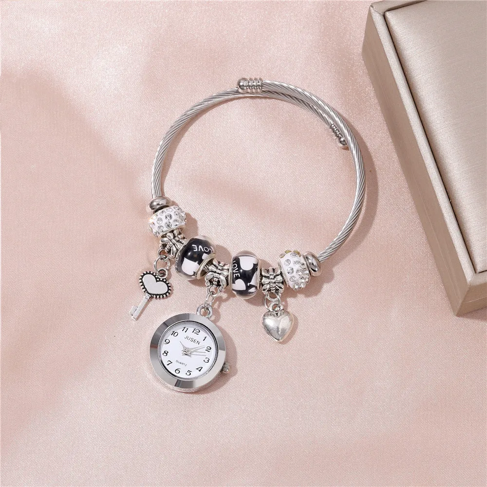 Women's bangle watch with love heart key pendant, alloy strap, white dial, black strap option