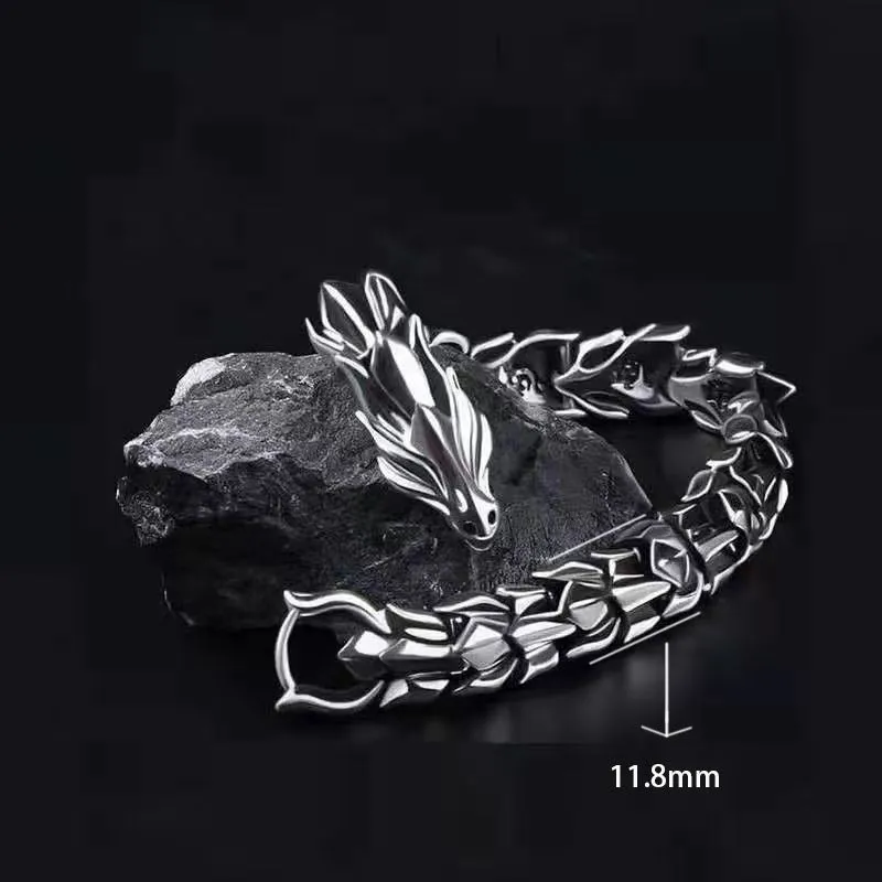 Men's silver geometric keel shape alloy bracelet on a neutral background showing minimal design