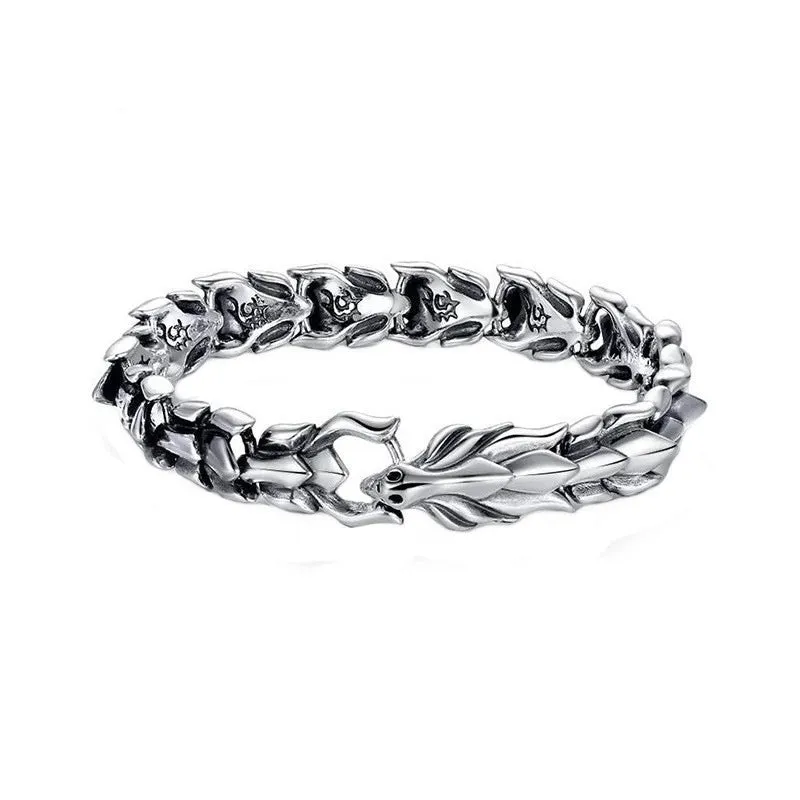 Men's silver geometric keel shape alloy bracelet on a neutral background showing minimal design