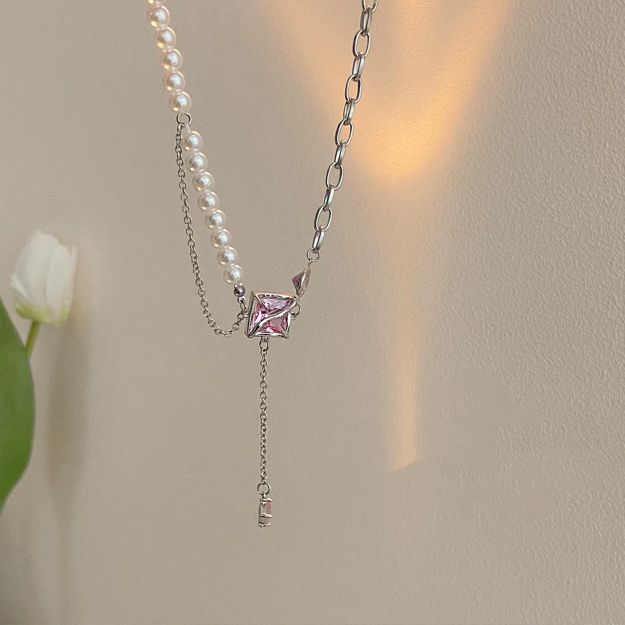 Pink crystal geometric pendant necklace on stainless steel box chain with mixed gem inlay