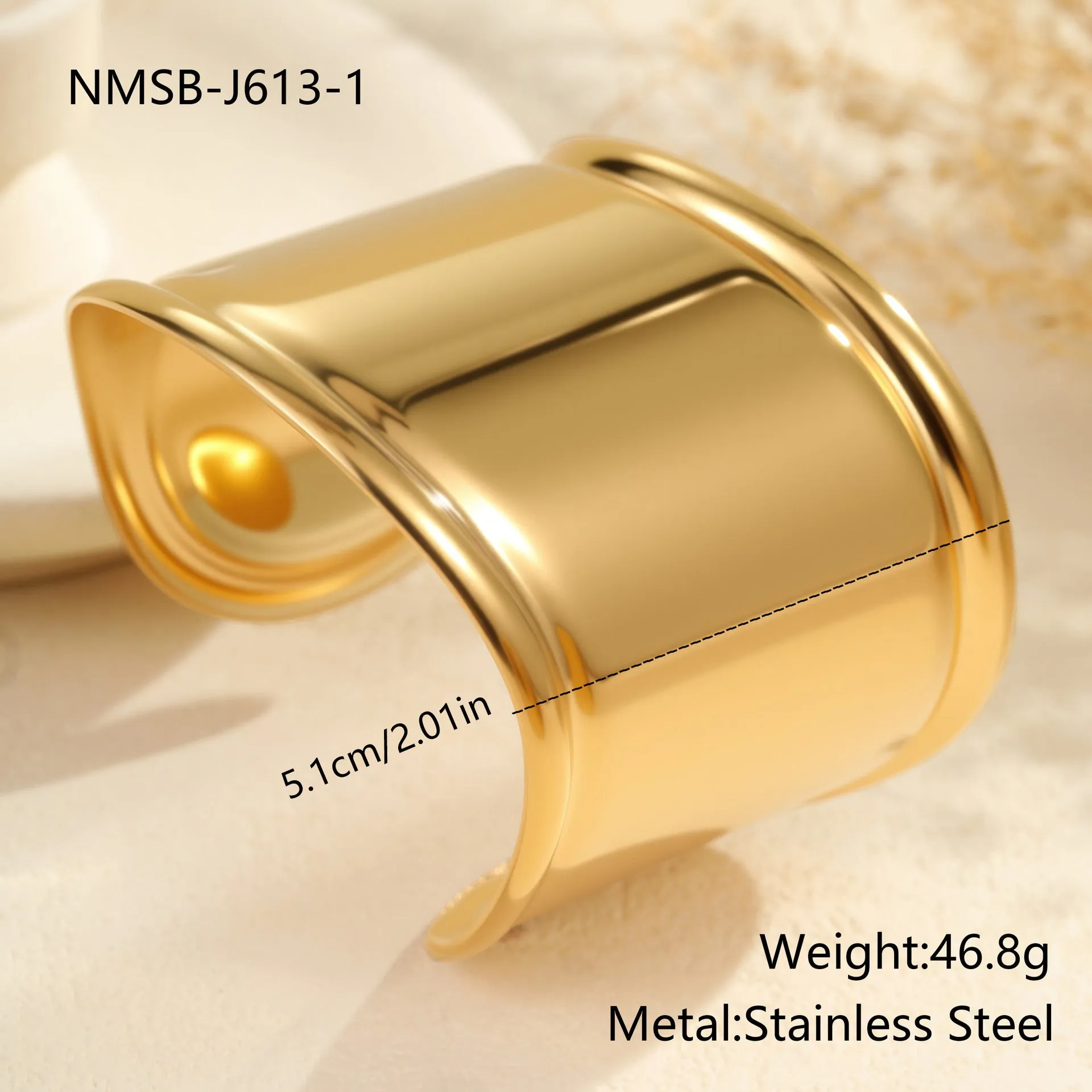 Women's wide geometric wave bracelet with gold plating and niche opening detail on wrist