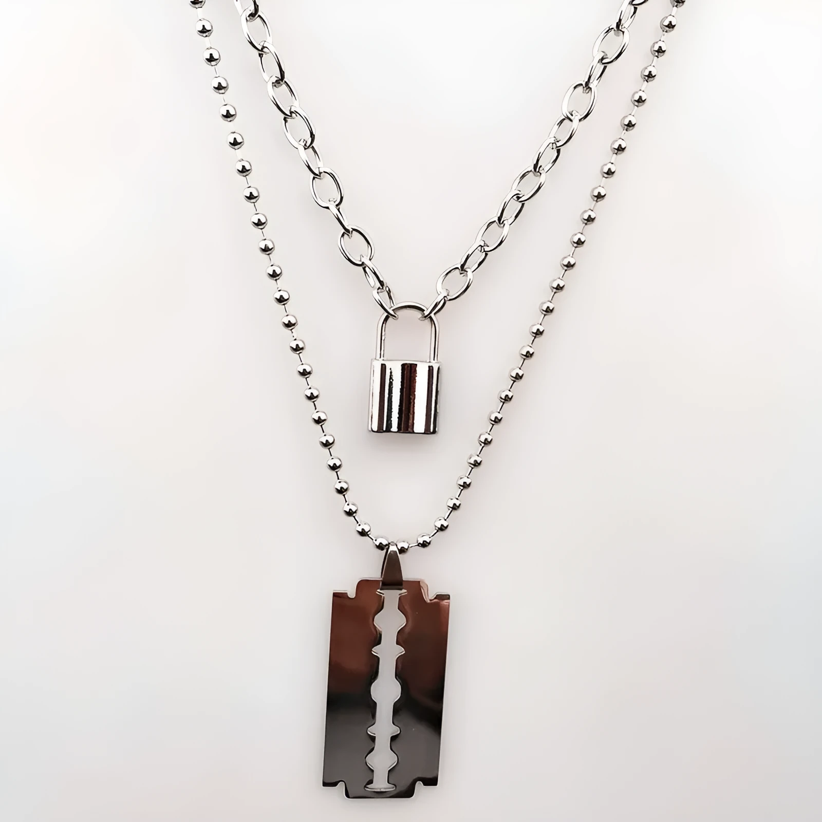 Layered chains punk necklace in alloy and titanium steel with electroplated finish in picture colour, Blade style option.