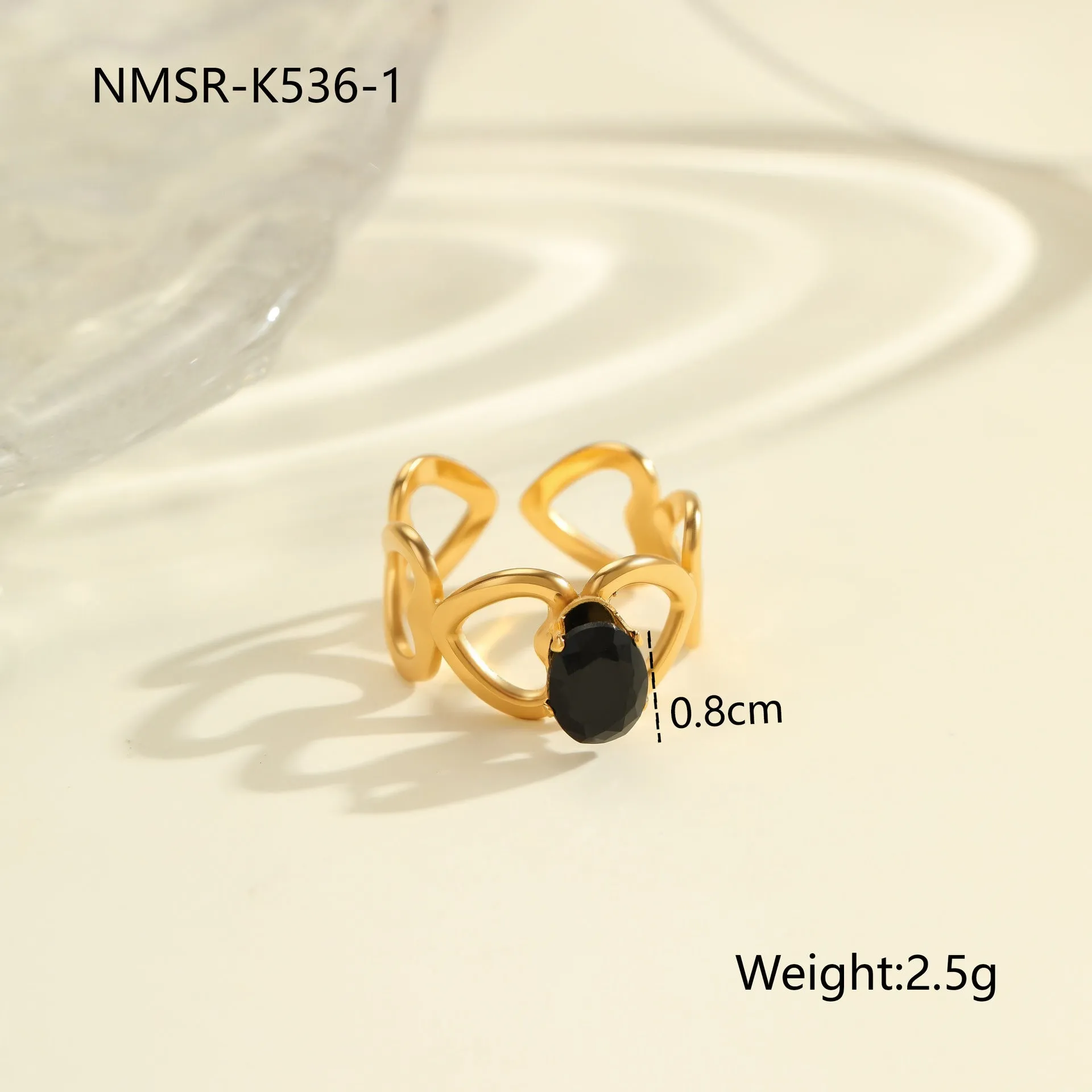 Geometric open mouth titanium steel ring for women with zircon inlays on a grey background
