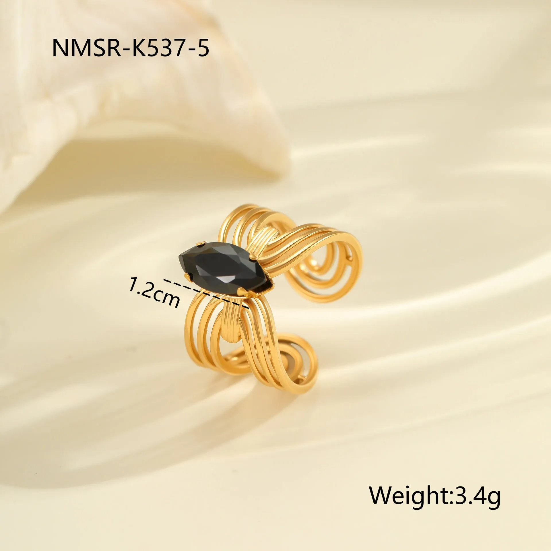 Geometric open mouth titanium steel ring for women with zircon inlays on a grey background