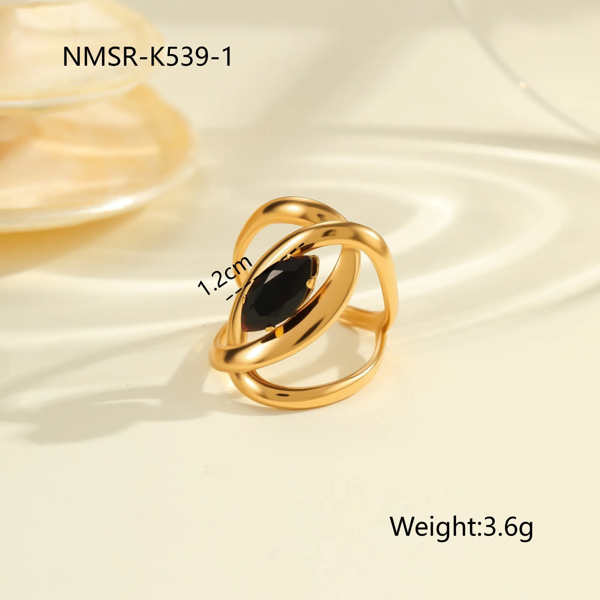 Geometric open mouth titanium steel ring for women with zircon inlays on a grey background