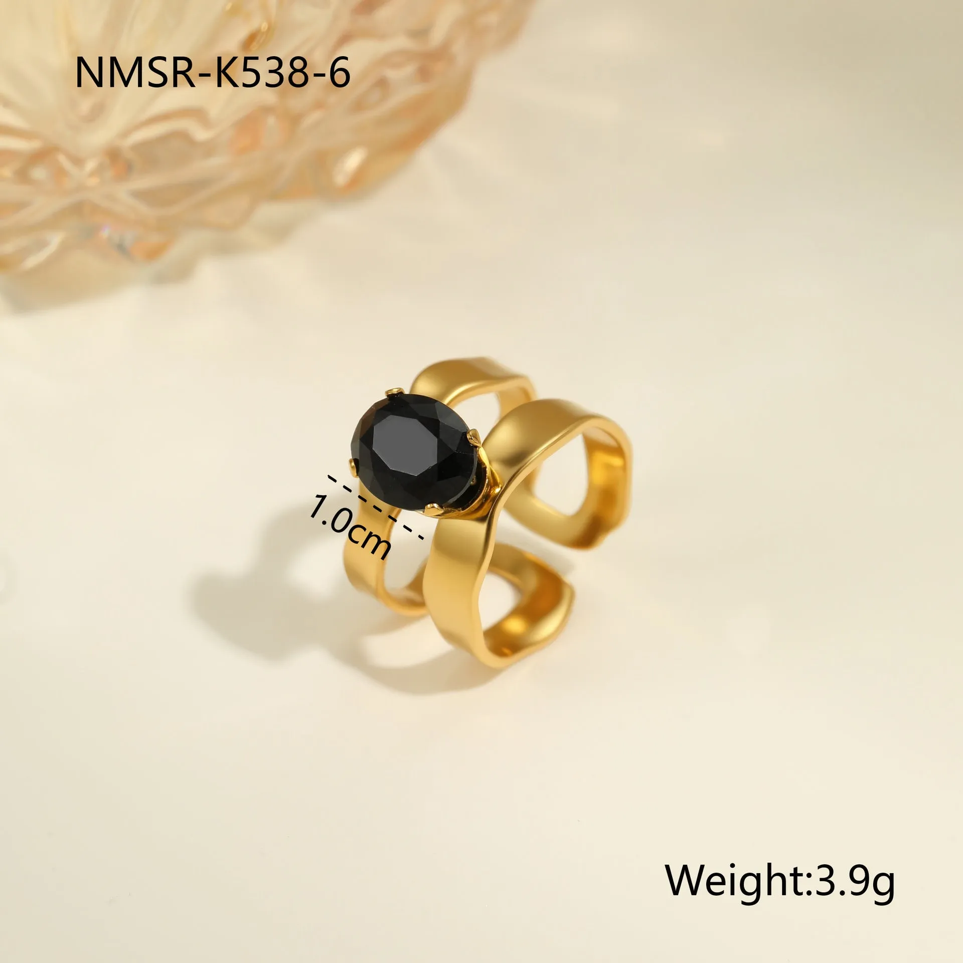 Geometric open mouth titanium steel ring for women with zircon inlays on a grey background