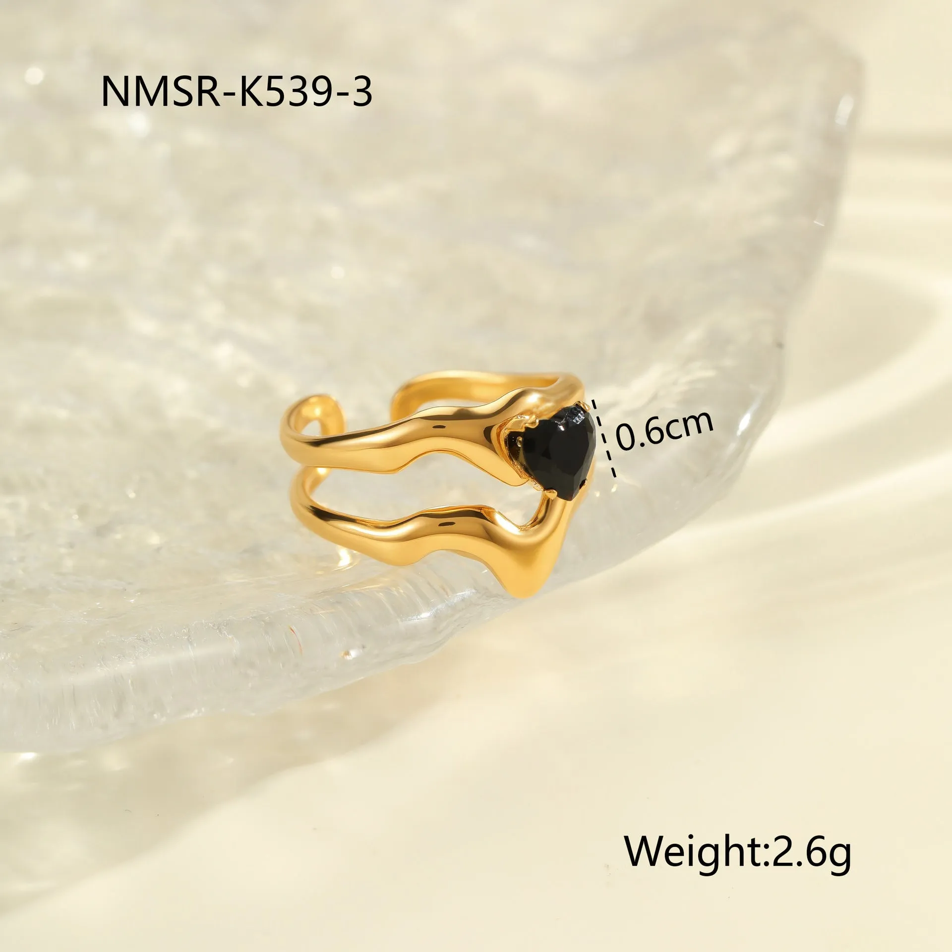 Geometric open mouth titanium steel ring for women with zircon inlays on a grey background