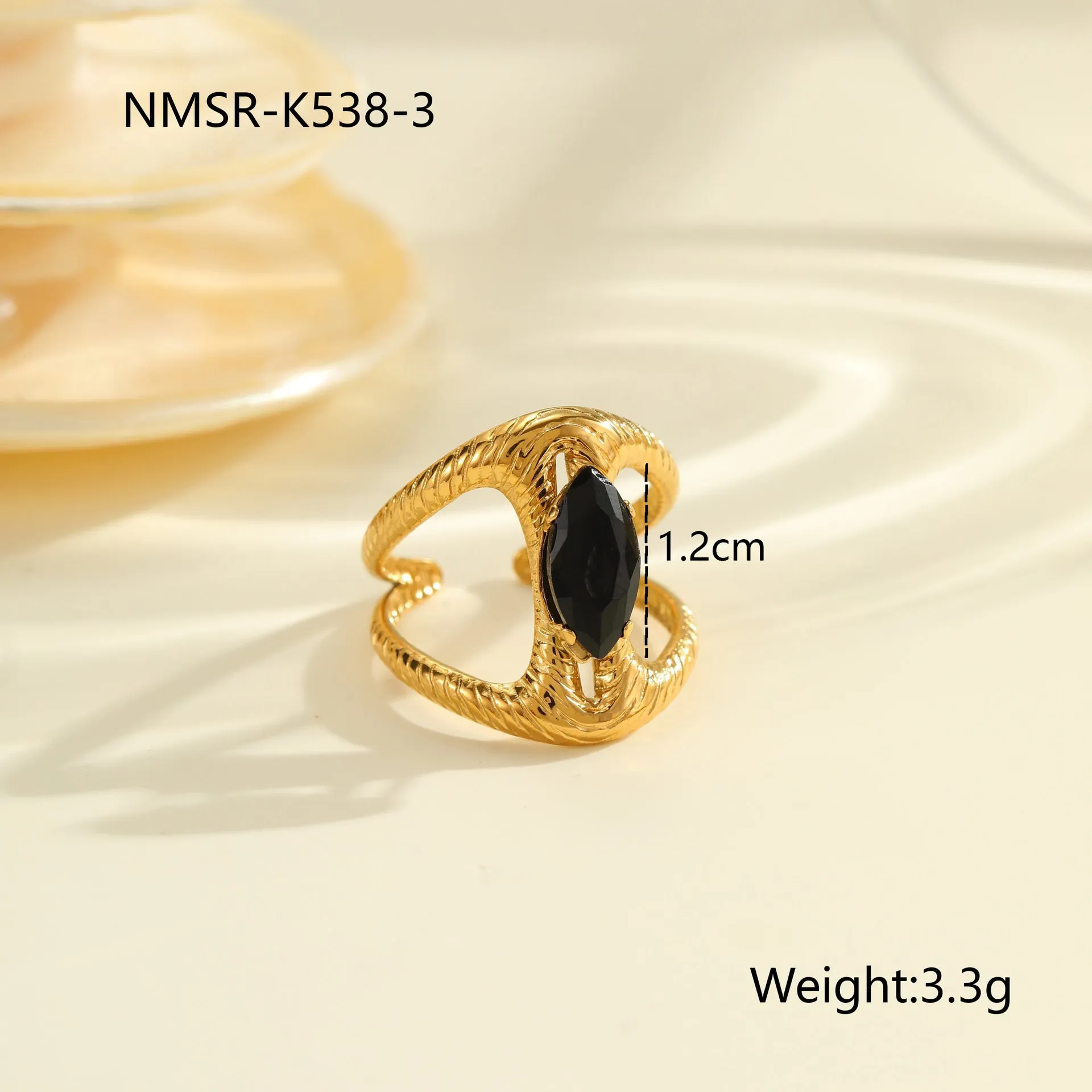 Geometric open mouth titanium steel ring for women with zircon inlays on a grey background