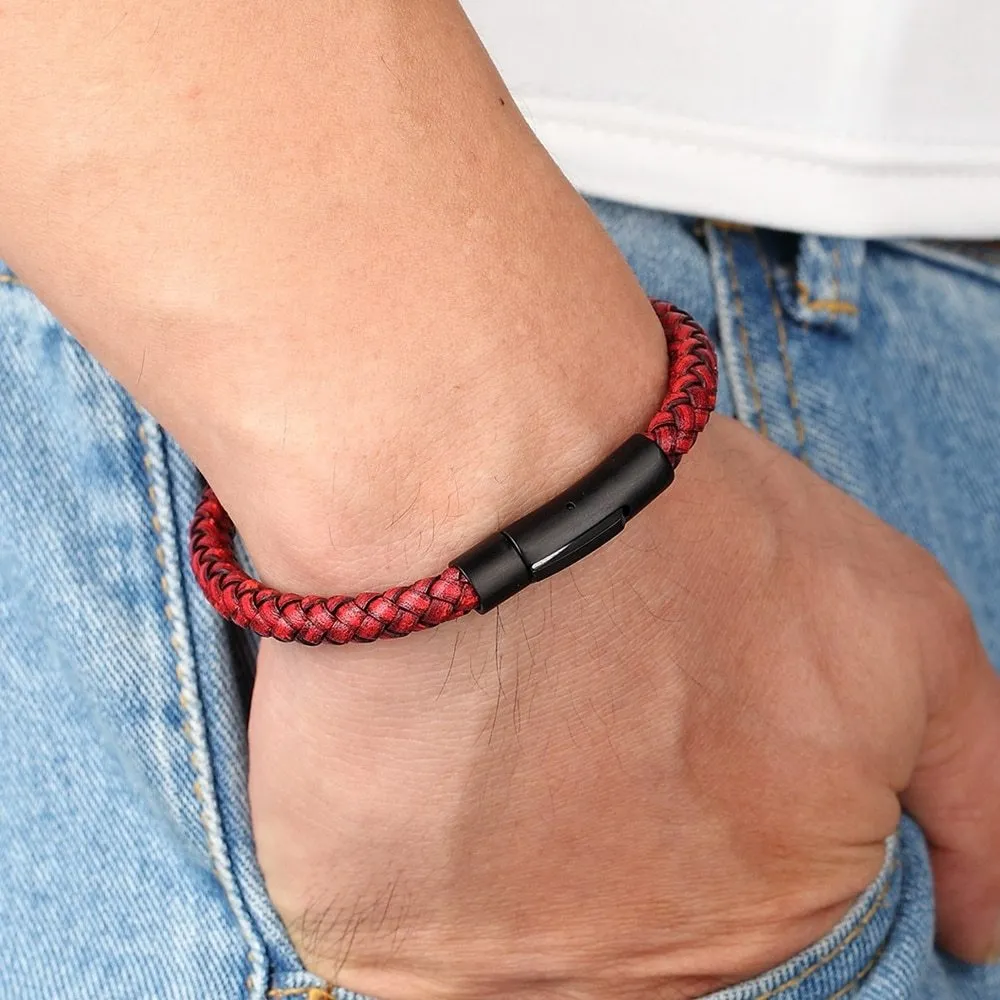 Black stainless steel bracelet with natural zircon stone on neutral background