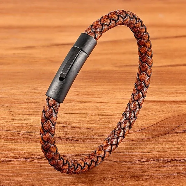 Black stainless steel bracelet with natural zircon stone on neutral background