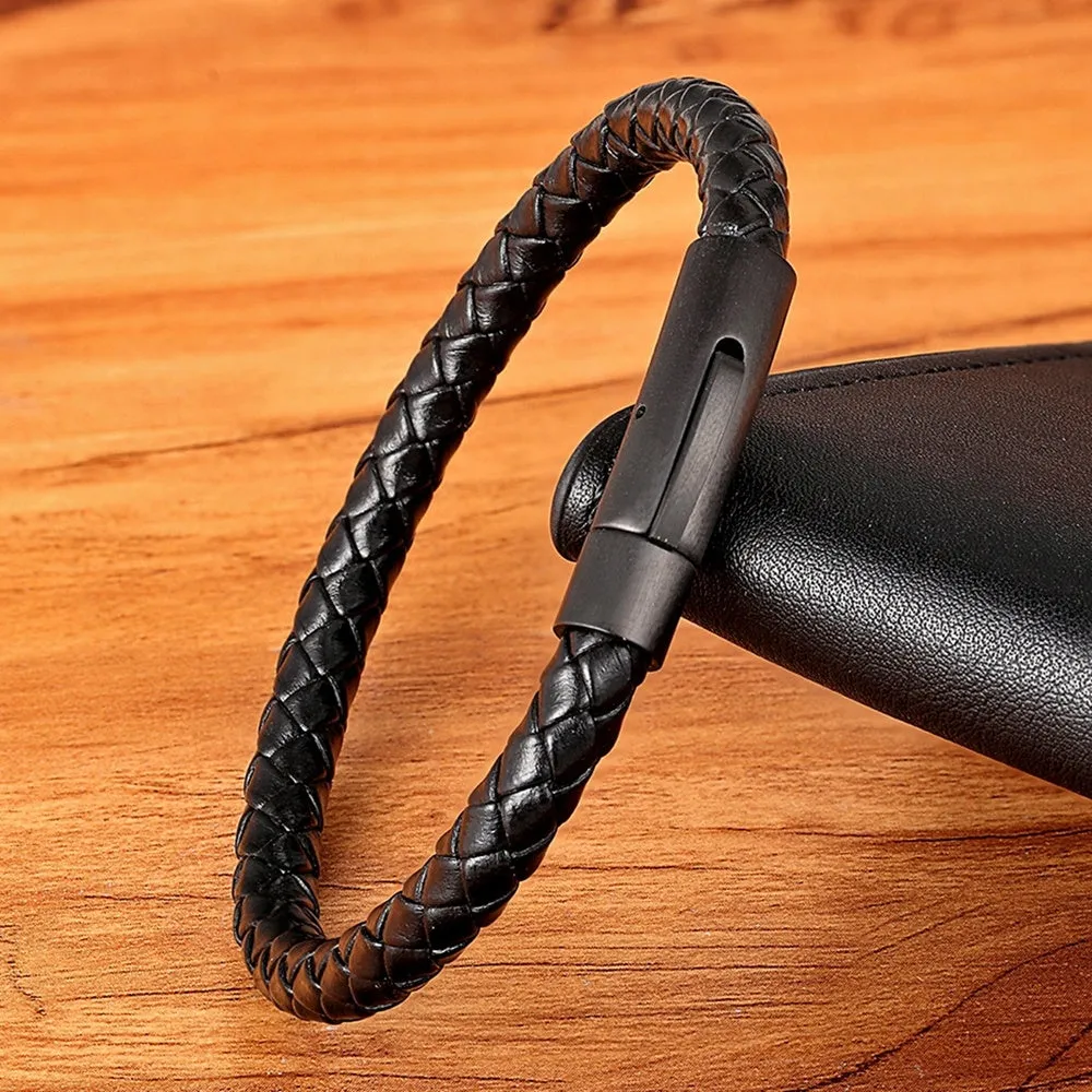 Black stainless steel bracelet with natural zircon stone on neutral background