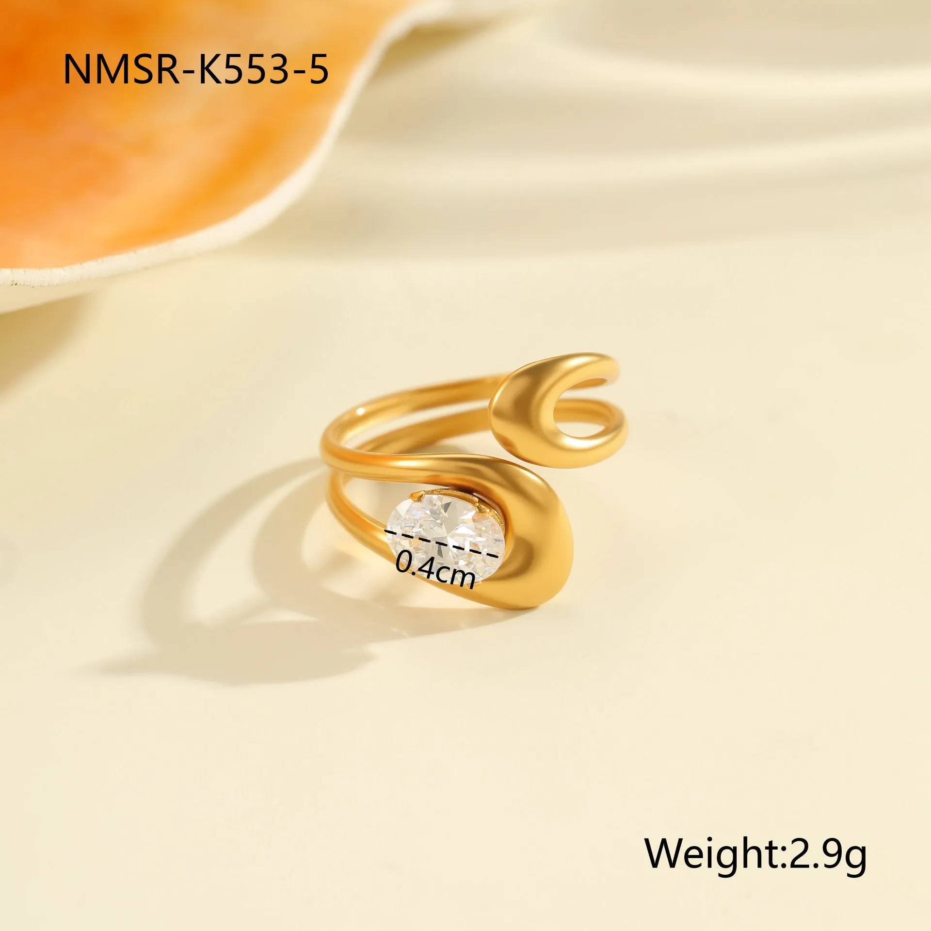 Geometric open mouth zircon ring in stainless steel with electroplated colour finish.