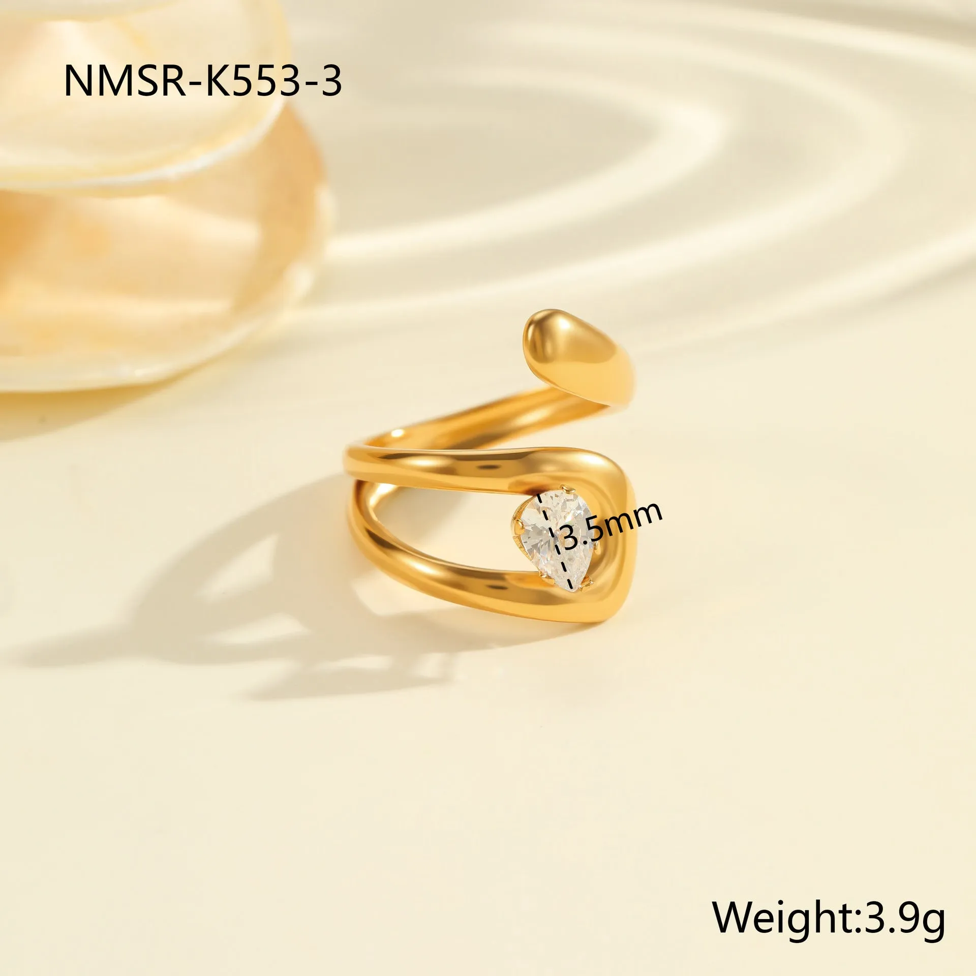 Geometric open mouth zircon ring in stainless steel with electroplated colour finish.