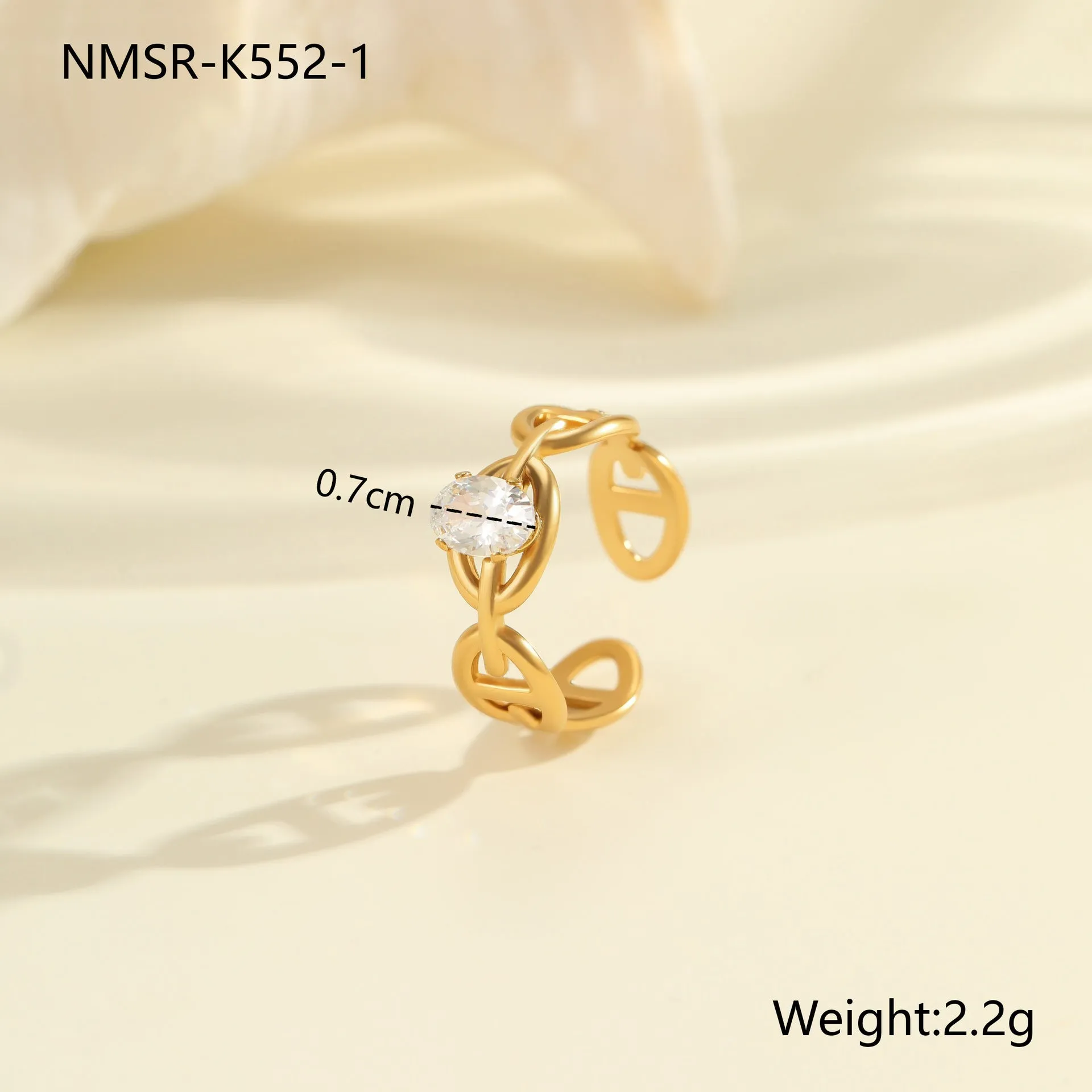 Geometric open mouth zircon ring in stainless steel with electroplated colour finish.